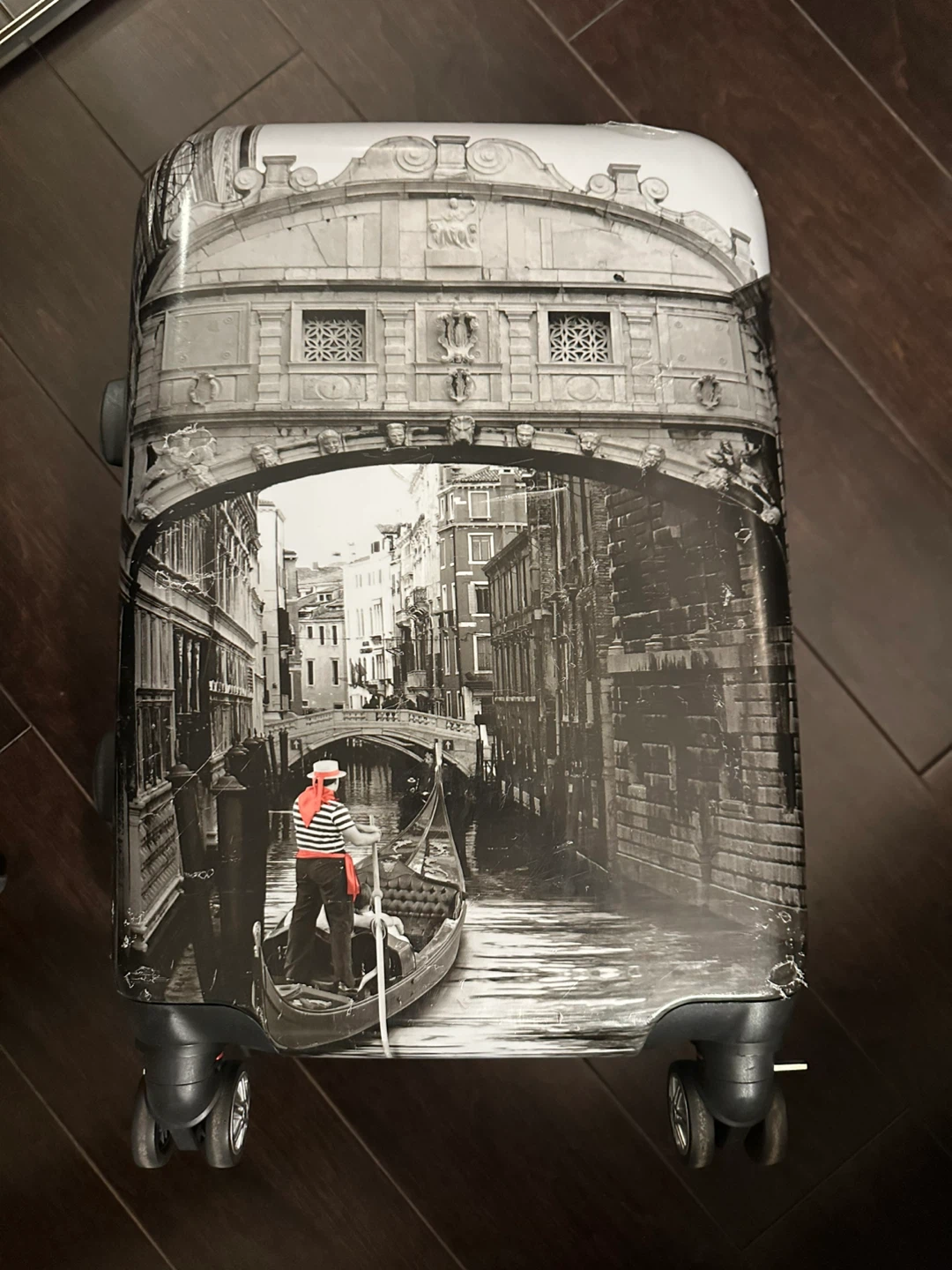 Hard-shell travel suitcase with city design