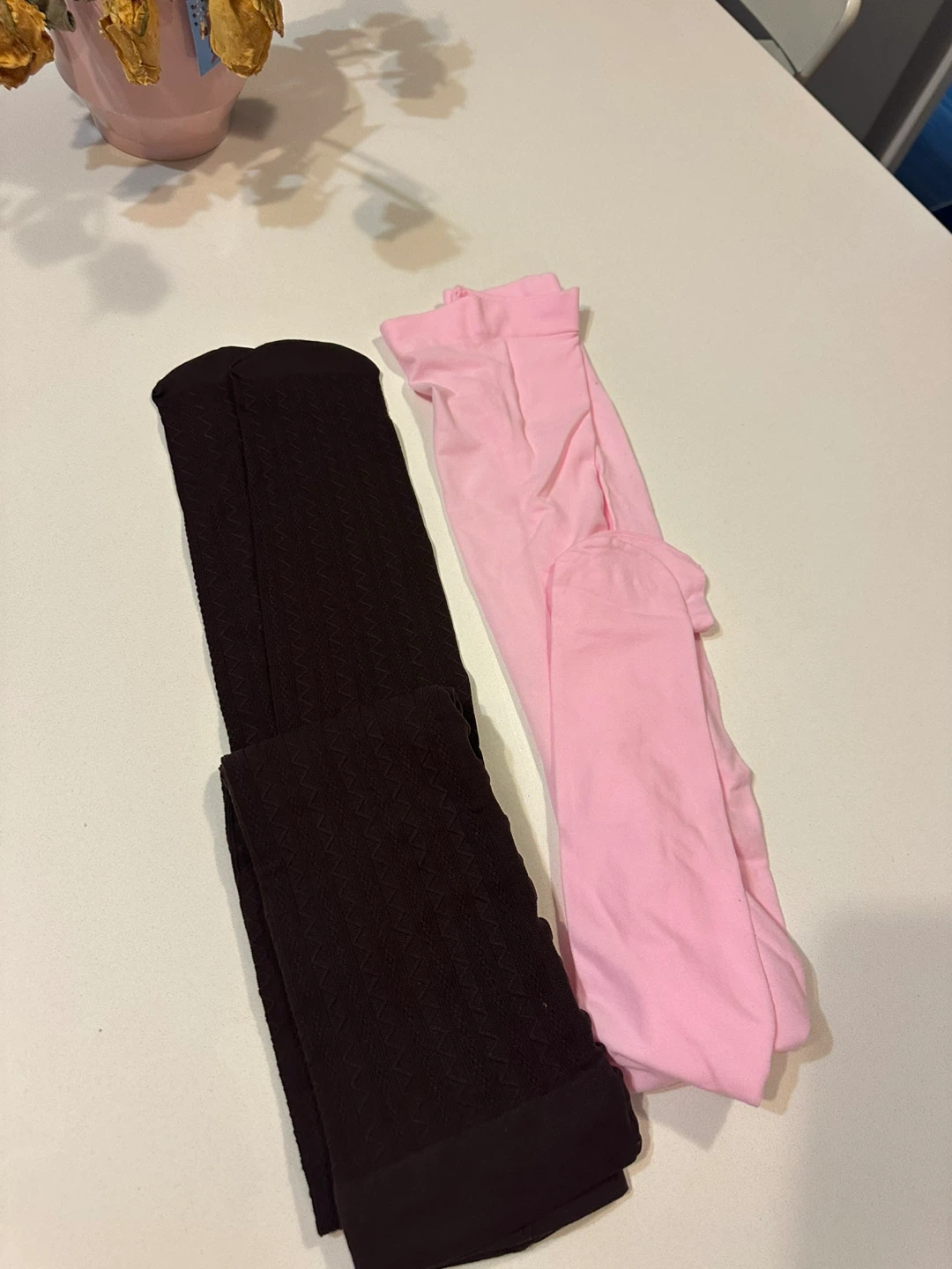 Two pairs of tights - brown patterned and pink