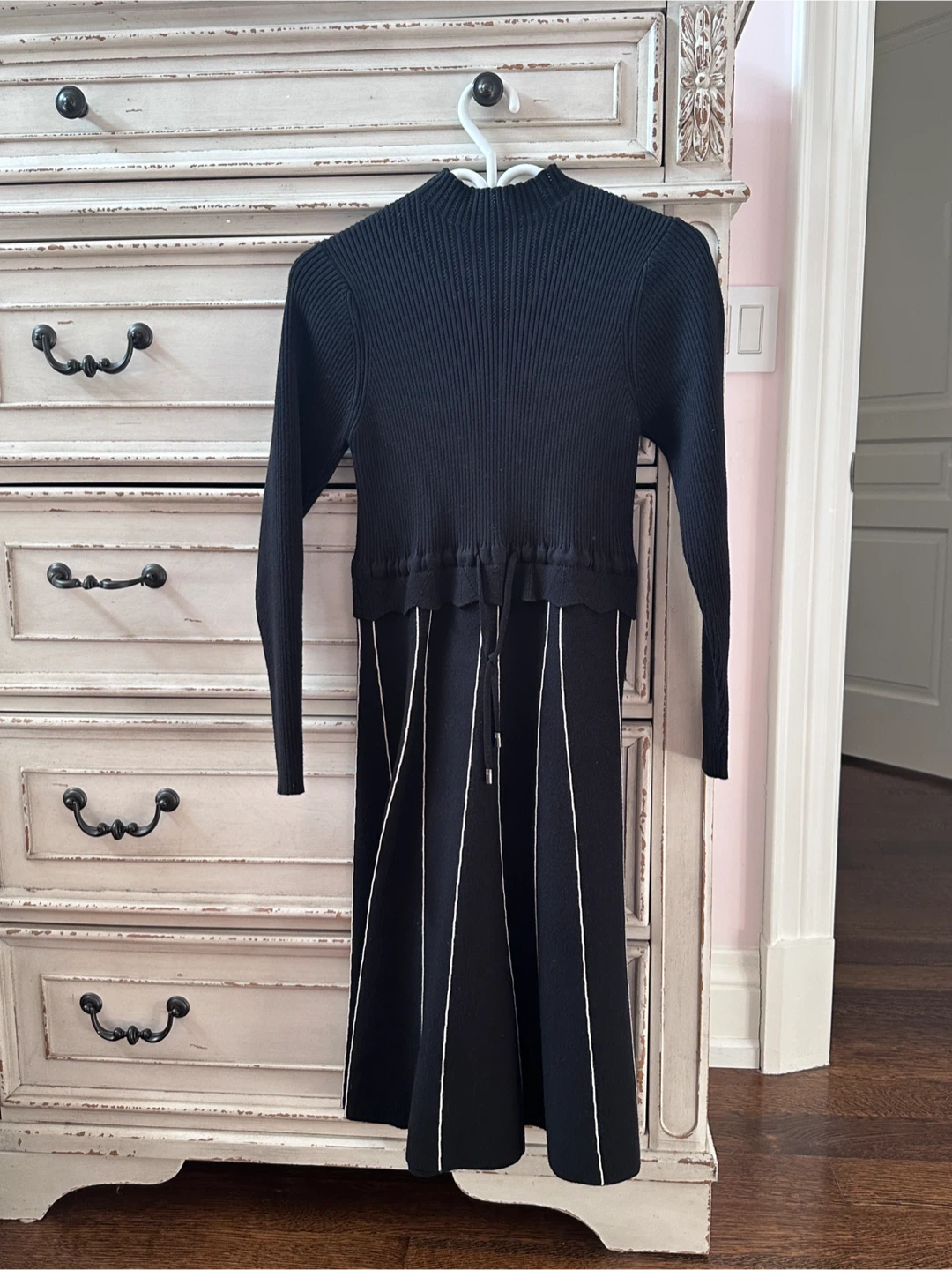Black ribbed knit sweater dress with white pinstripes