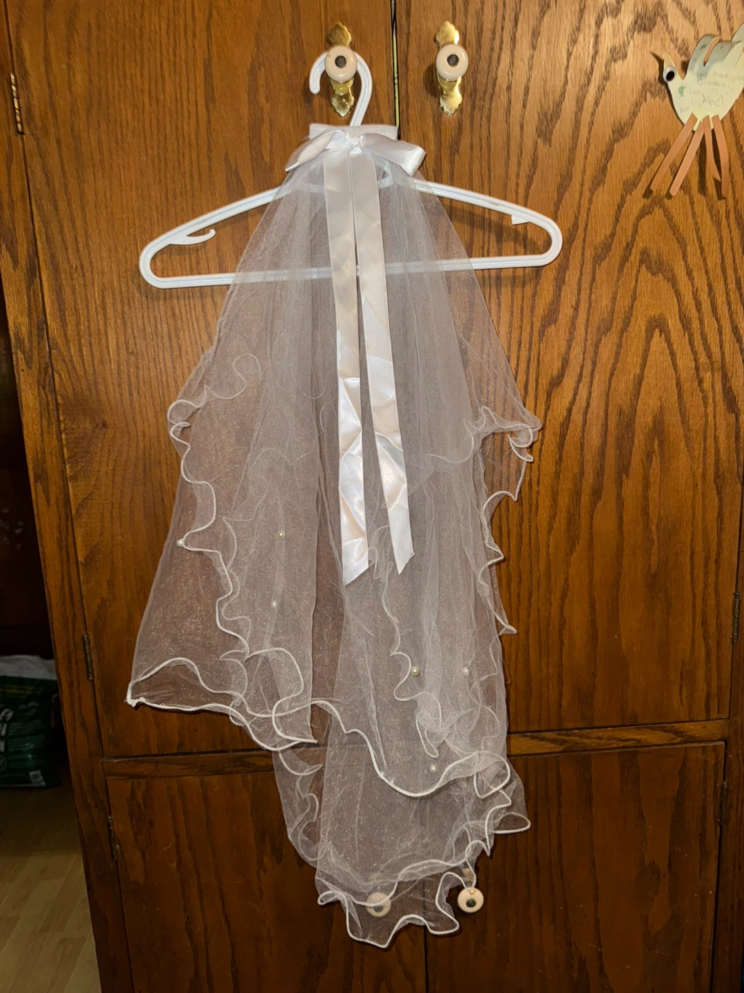 Child’s white wedding veil, new