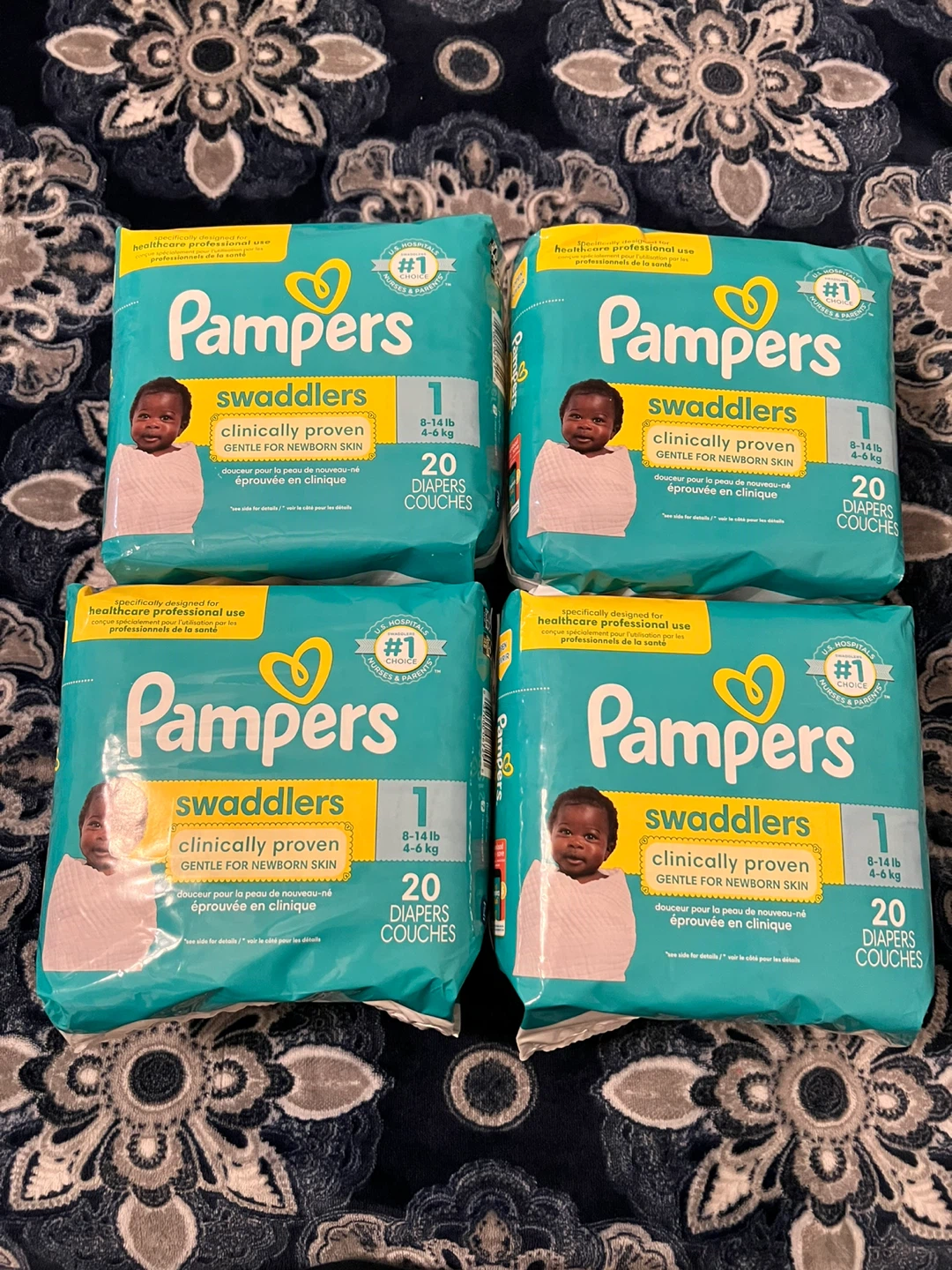 4 packs of 20 Pampers Swaddlers Diapers - Size 1