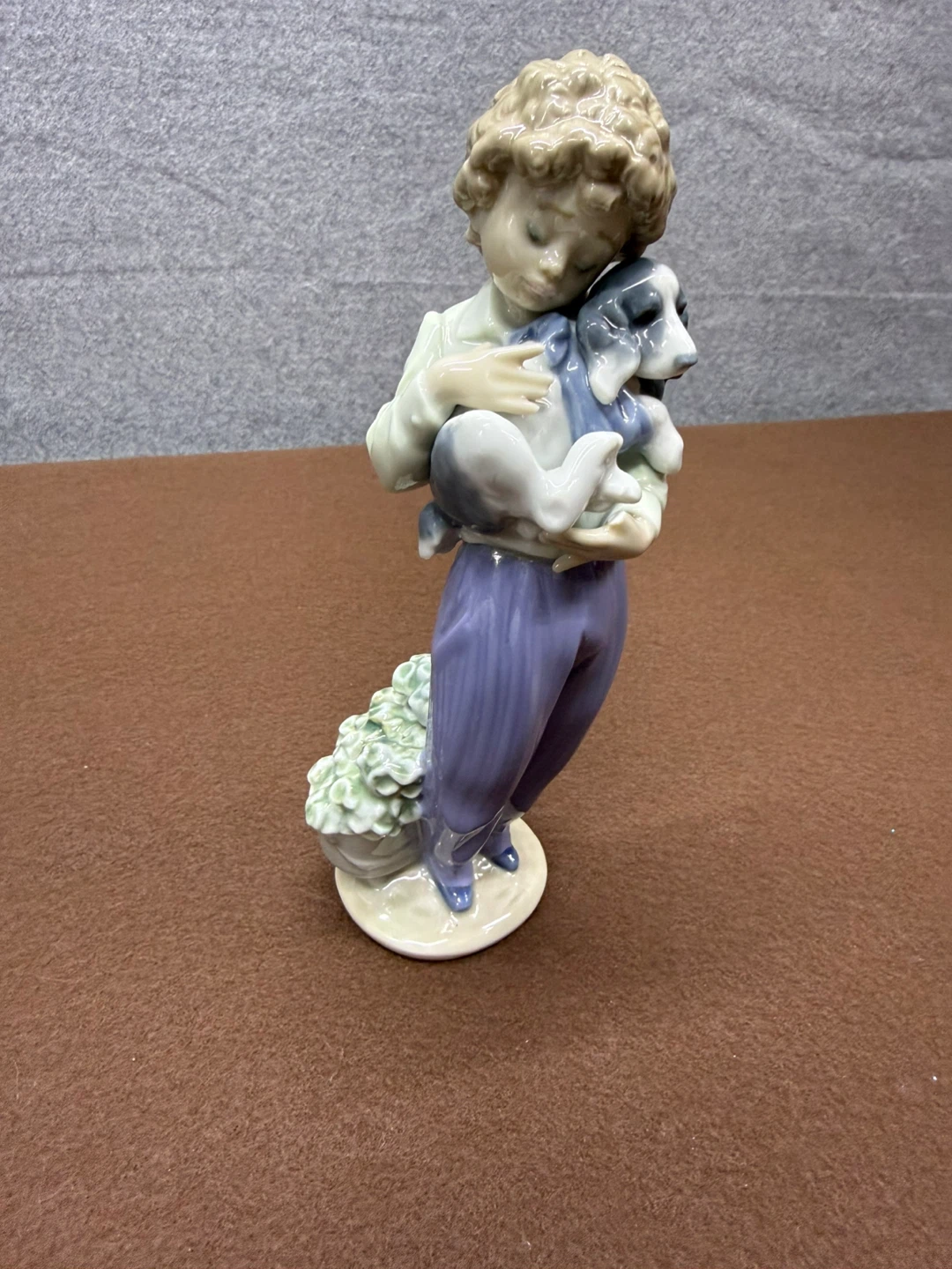 Porcelain Figurine of a Child Holding a Dog with Flowers - photo 3