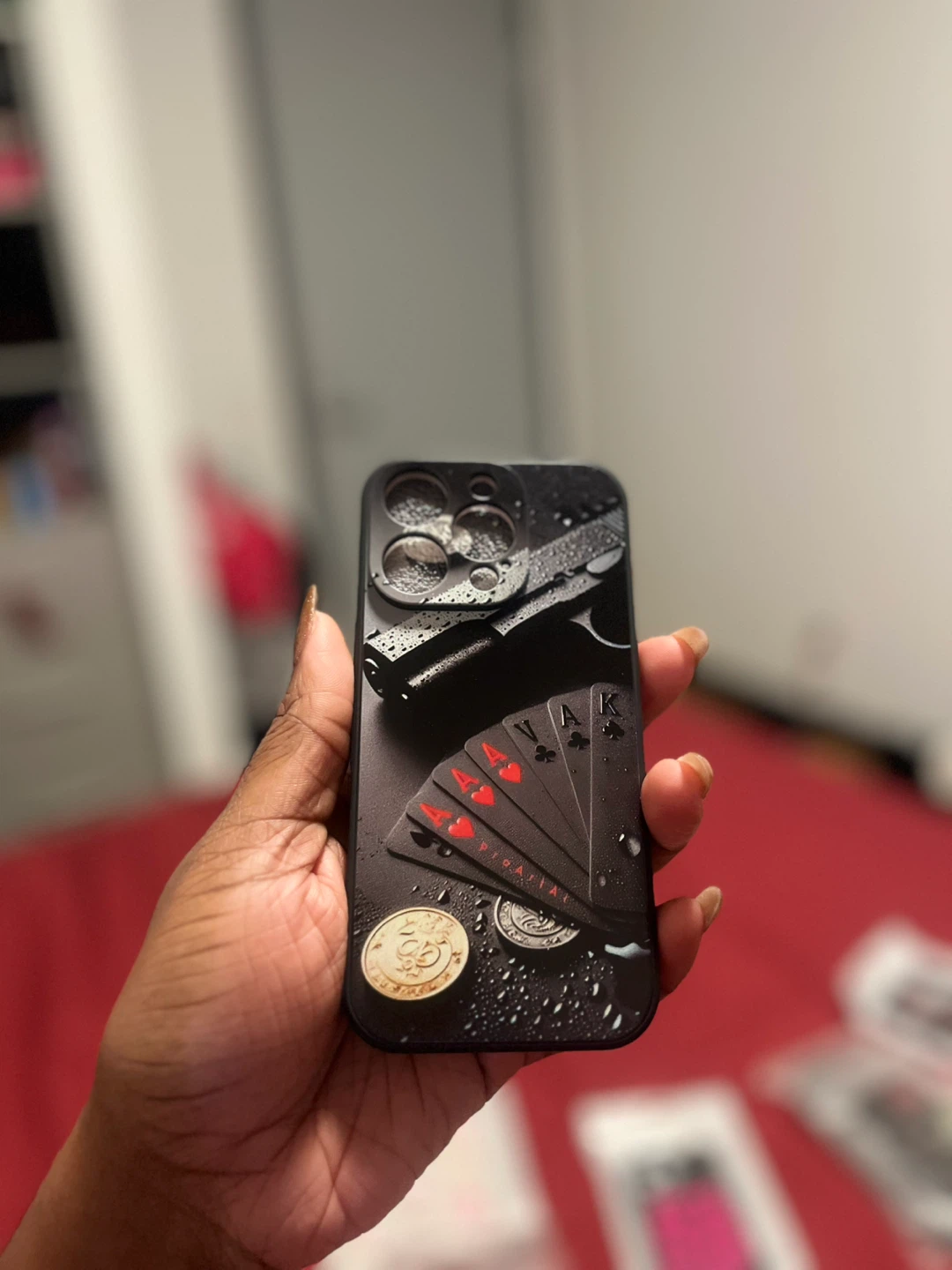 IPhone 16 Pro Case with Card and Gun Design