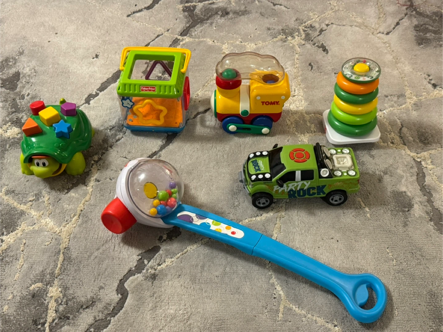 Fisher-Price, Tomy, and Party Rock Toy Bundle