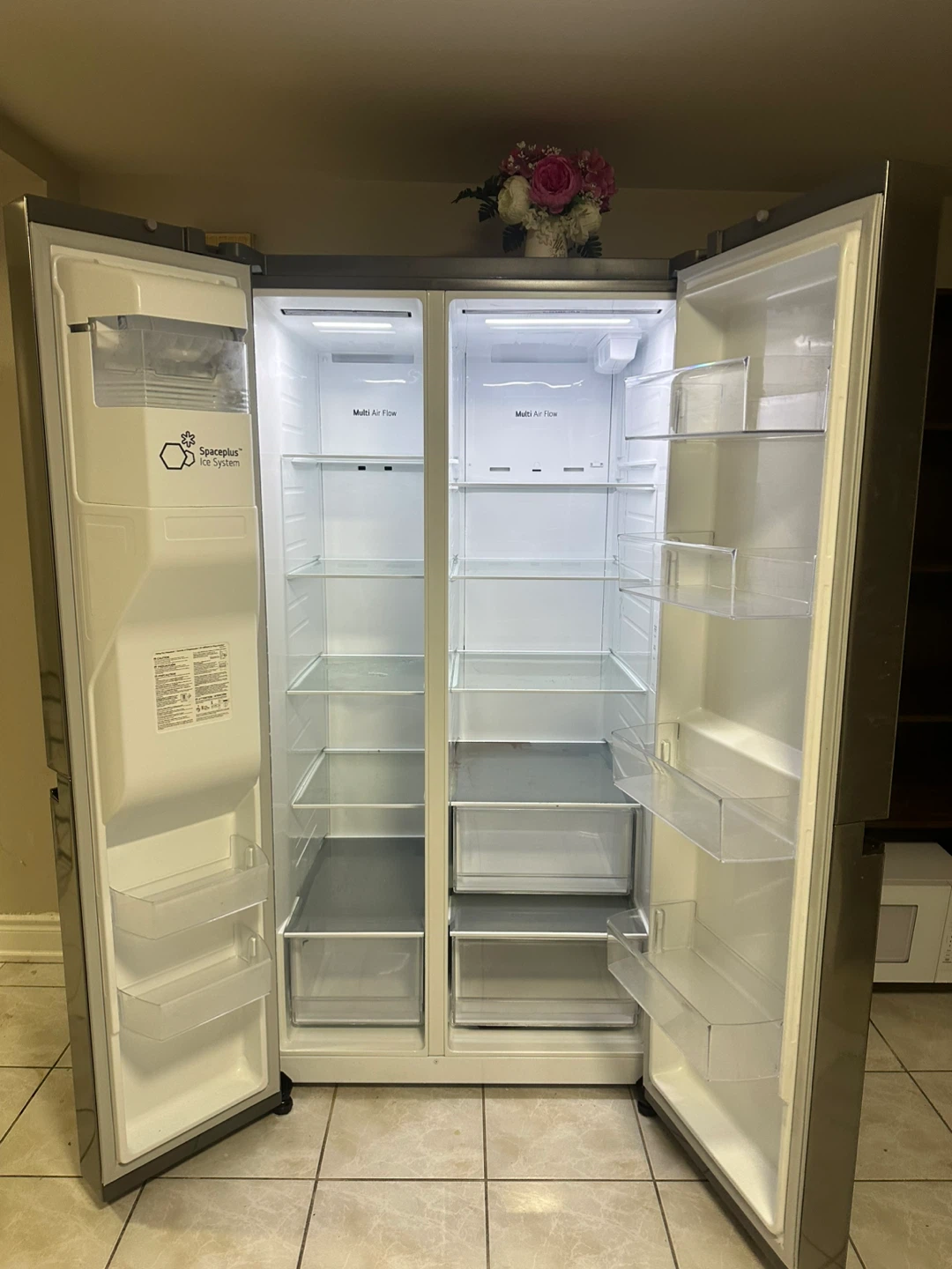 LG Side by Side Refrigerator with Ice Dispenser - photo 2