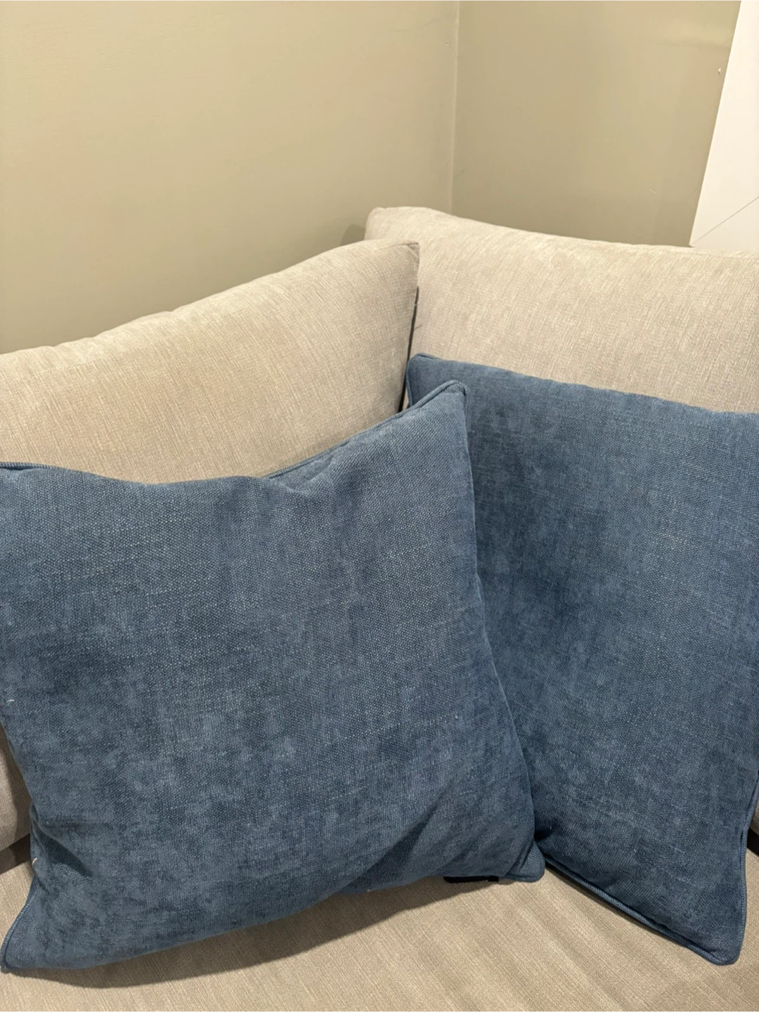 Two throw pillows - blue and beige