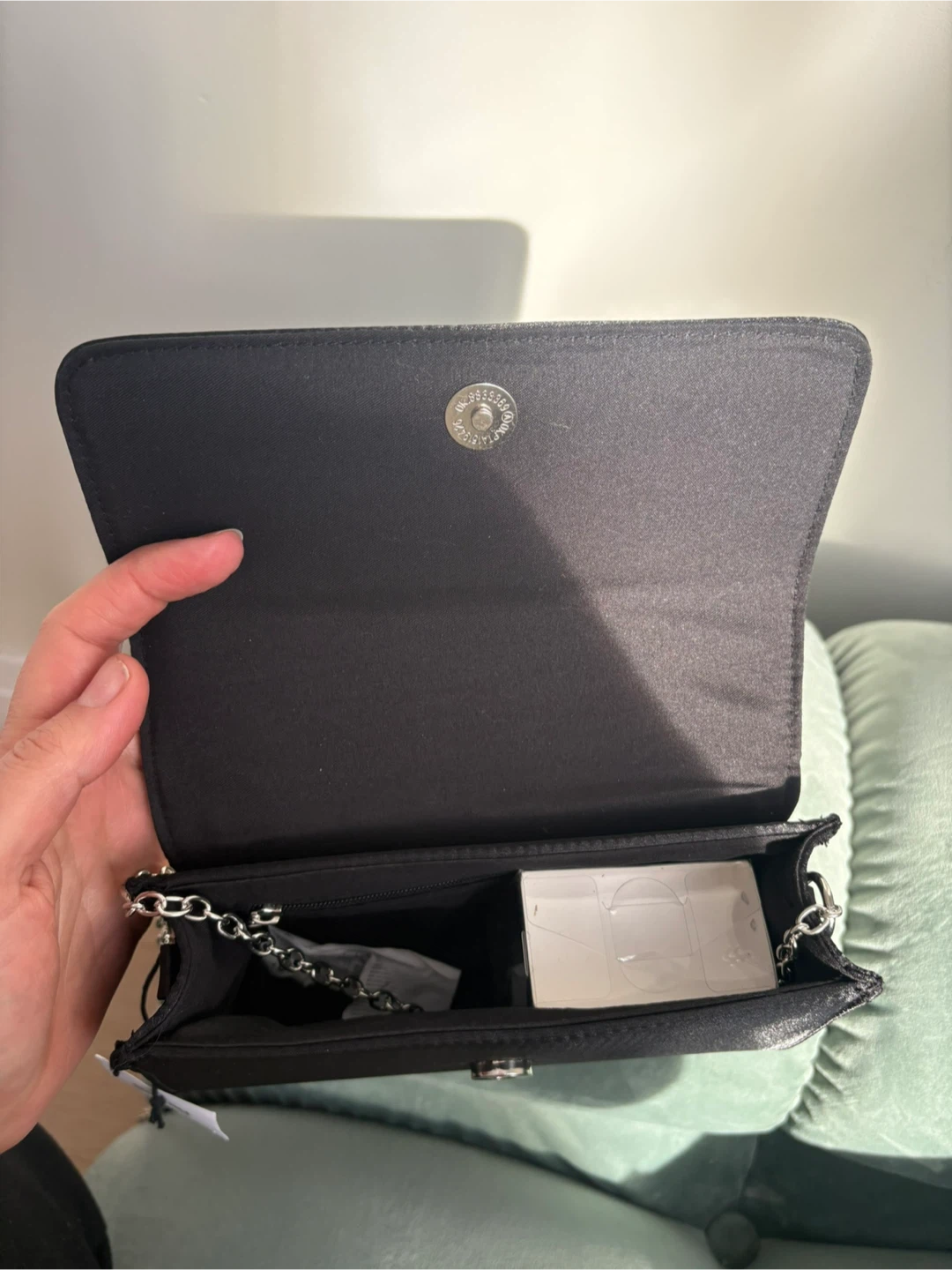 Black clutch with rhinestone bow and silver chain - photo 2