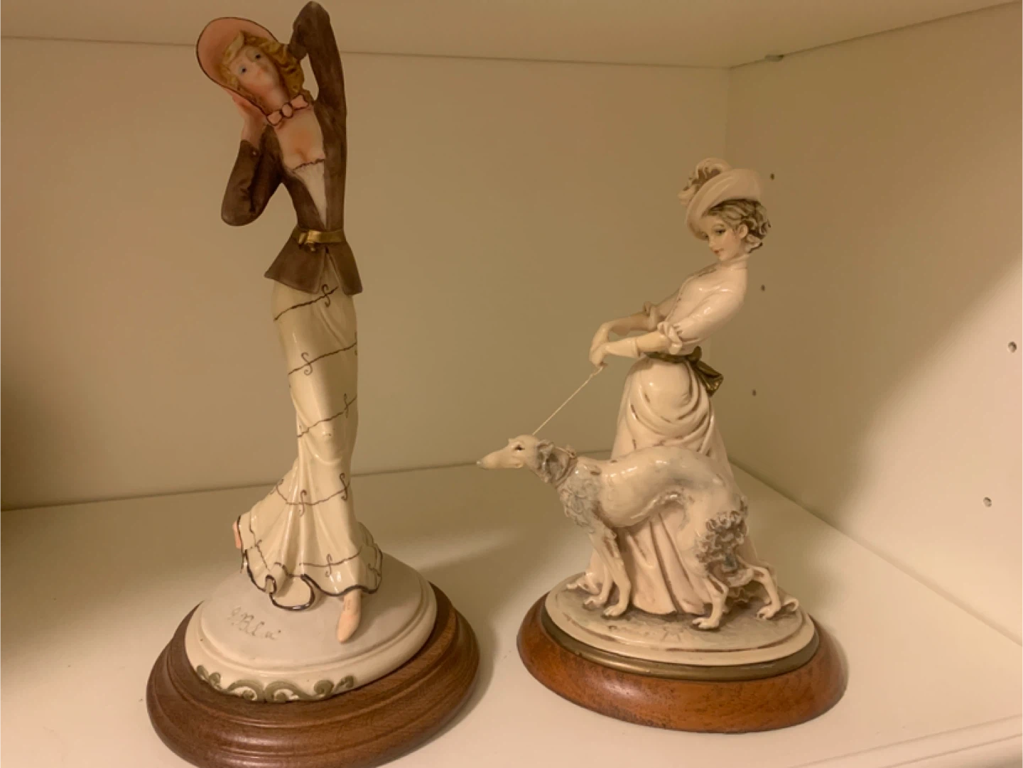 Pair of Elegant Lady Figurines with Dogs