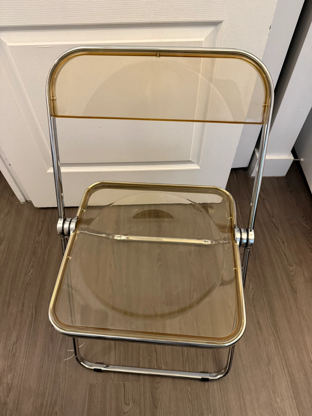 Two Transparent Amber Folding Chair