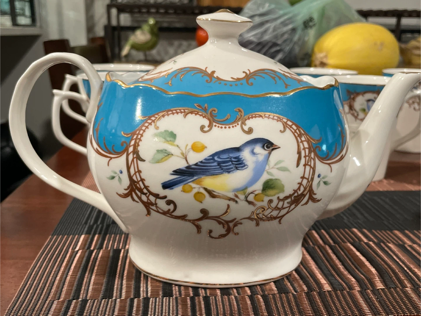 12 Teacups and old style Teapot