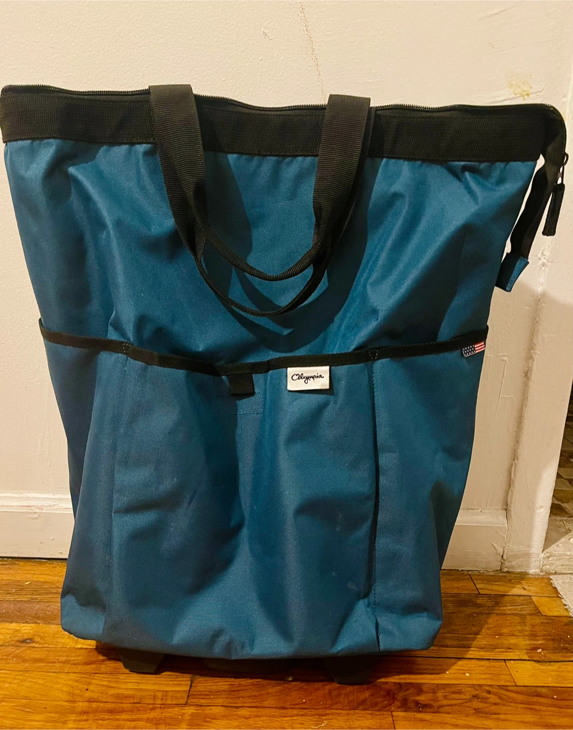 Olympia Luggage Teal Rolling Tote Bag