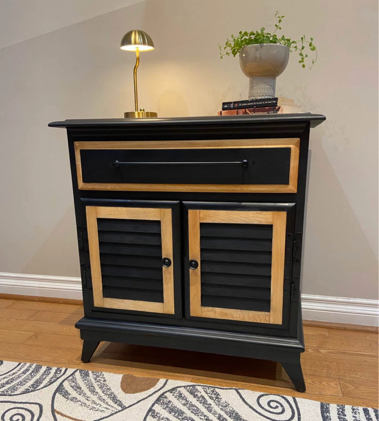 Black Two-Door Cabinet with Drawer