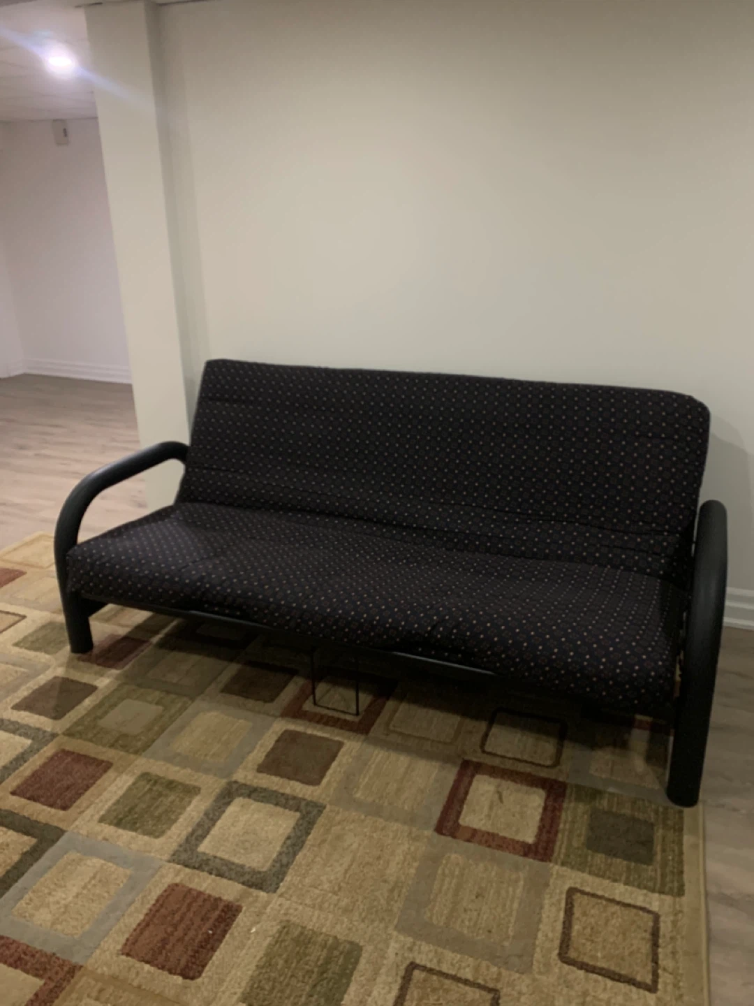 Futon Couch with Patterned Cushions