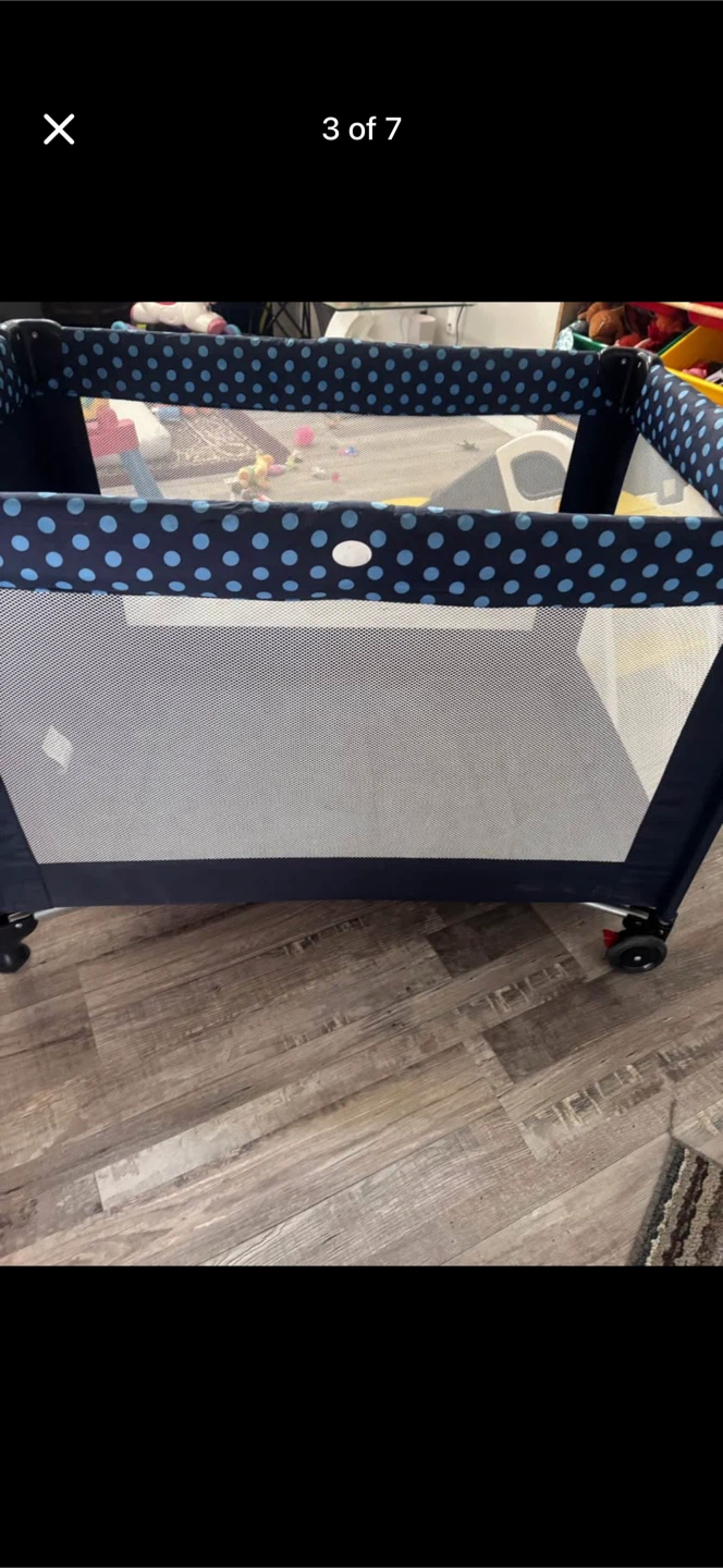 Navy blue polka dot playpen/travel crib