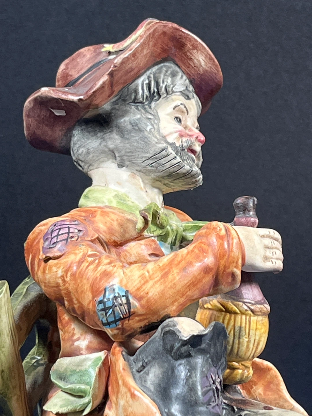 man sitting on a bench with a bottle - photo 4