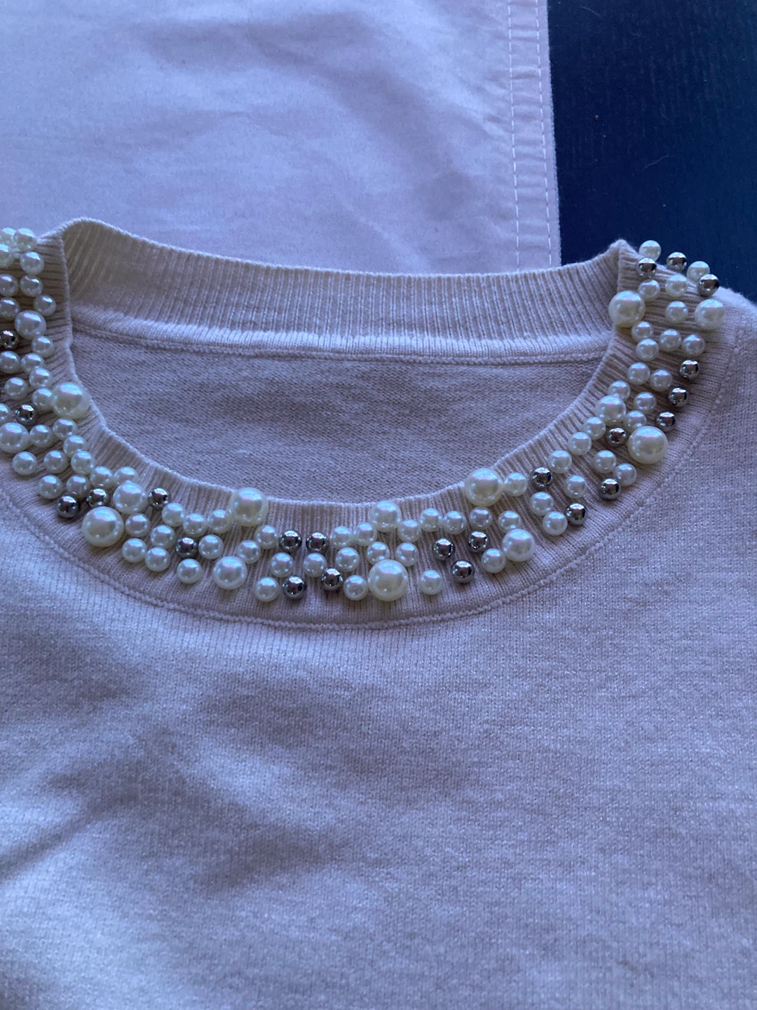 Cream sweater with stone embelishment