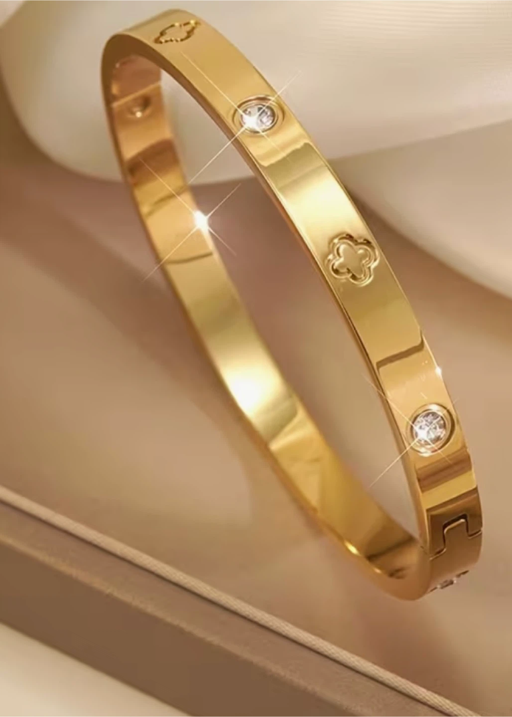 Gold Bangle Bracelet with Clover Detail