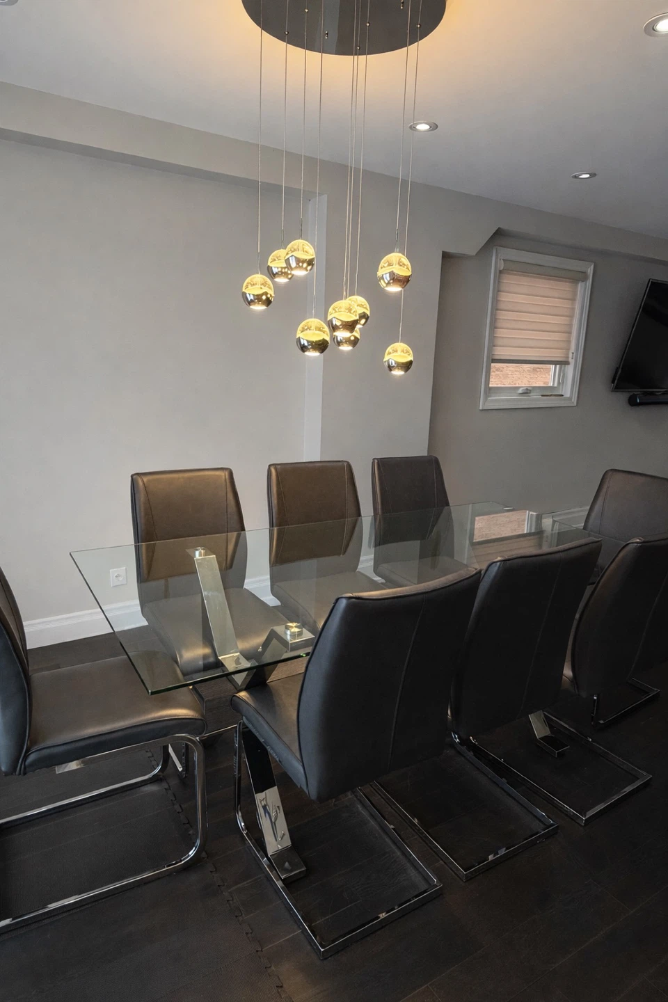 Modern Glass Dining Table with 8 Leather Chairs