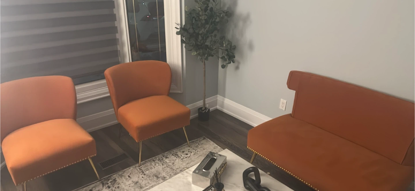 Orange Accent Chair with Gold Legs and love seat