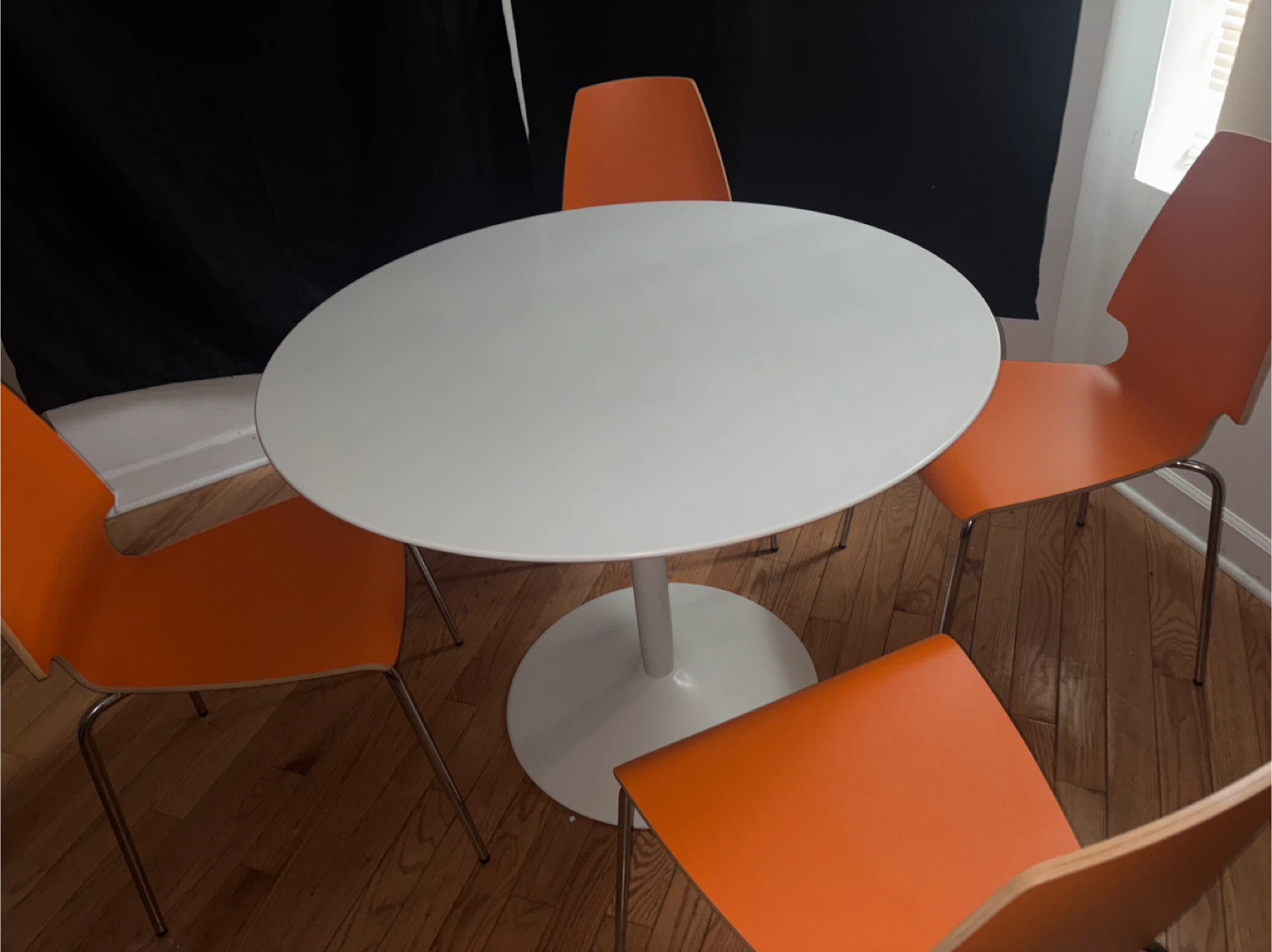 White ikea  round table with 4 vintage orange ikea Vilmar chairs