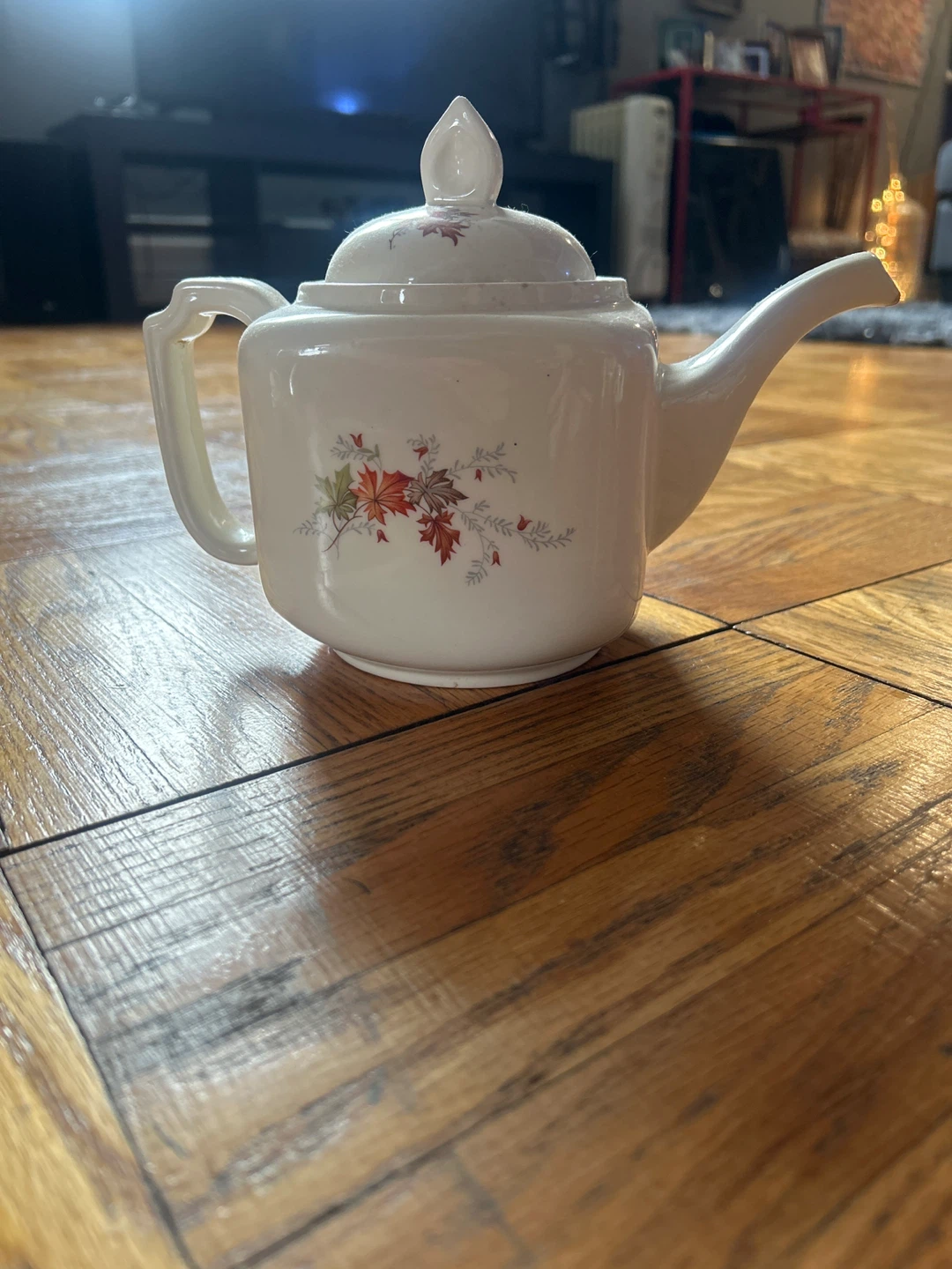 White Ceramic Teapot with Leaf Design