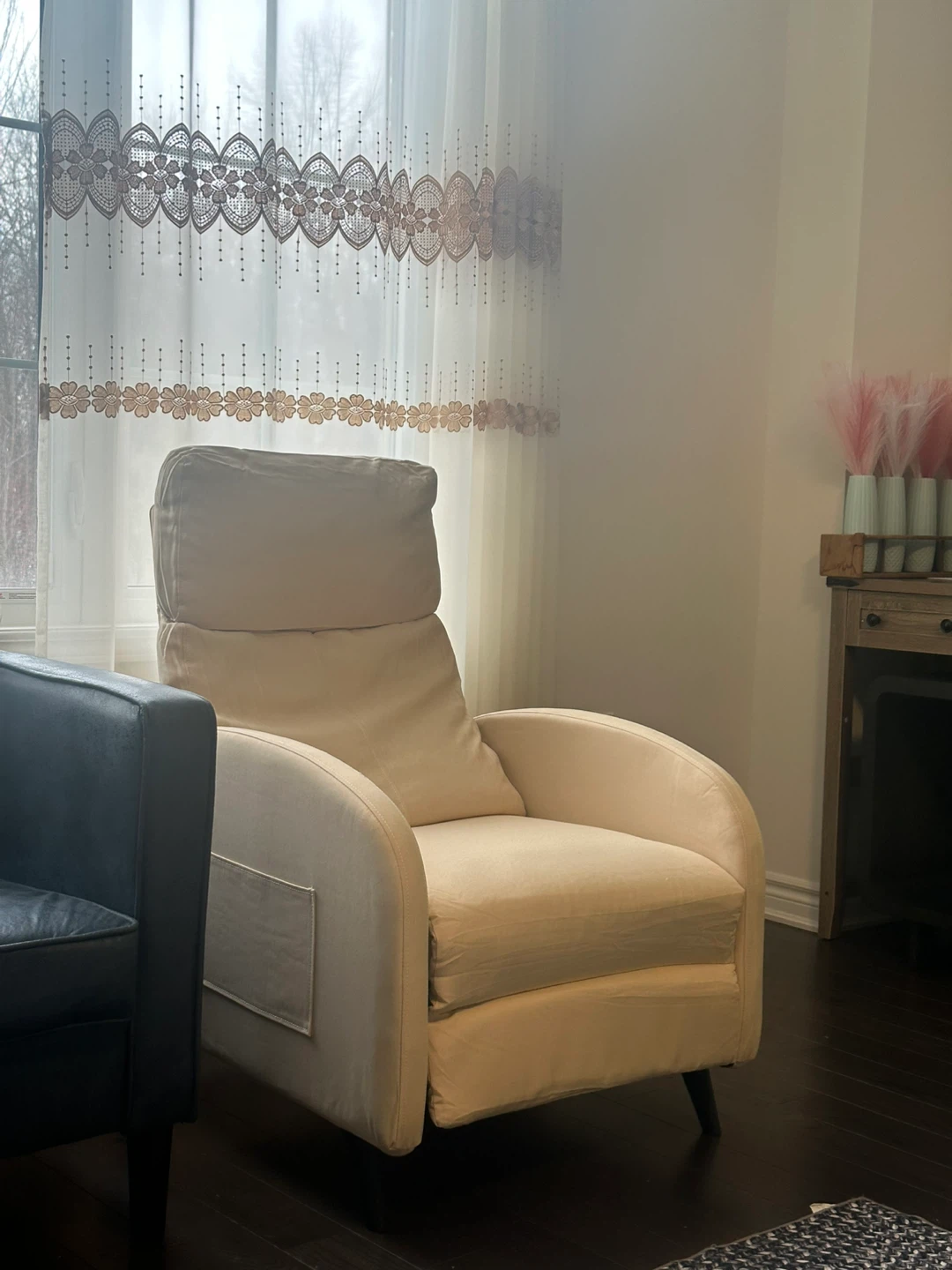 Cream coloured armchair