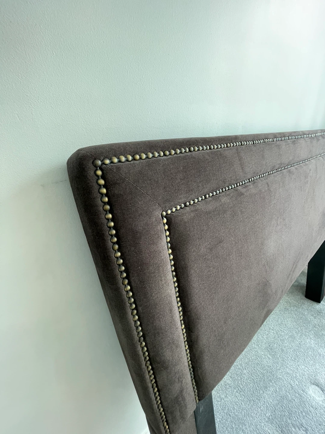 Brown Upholstered Headboard with Nailhead Trim