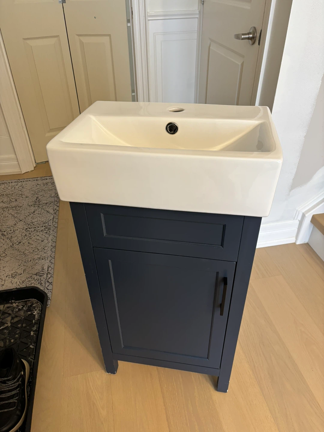 White Sink with Navy Blue Vanity Cabinet - photo 2