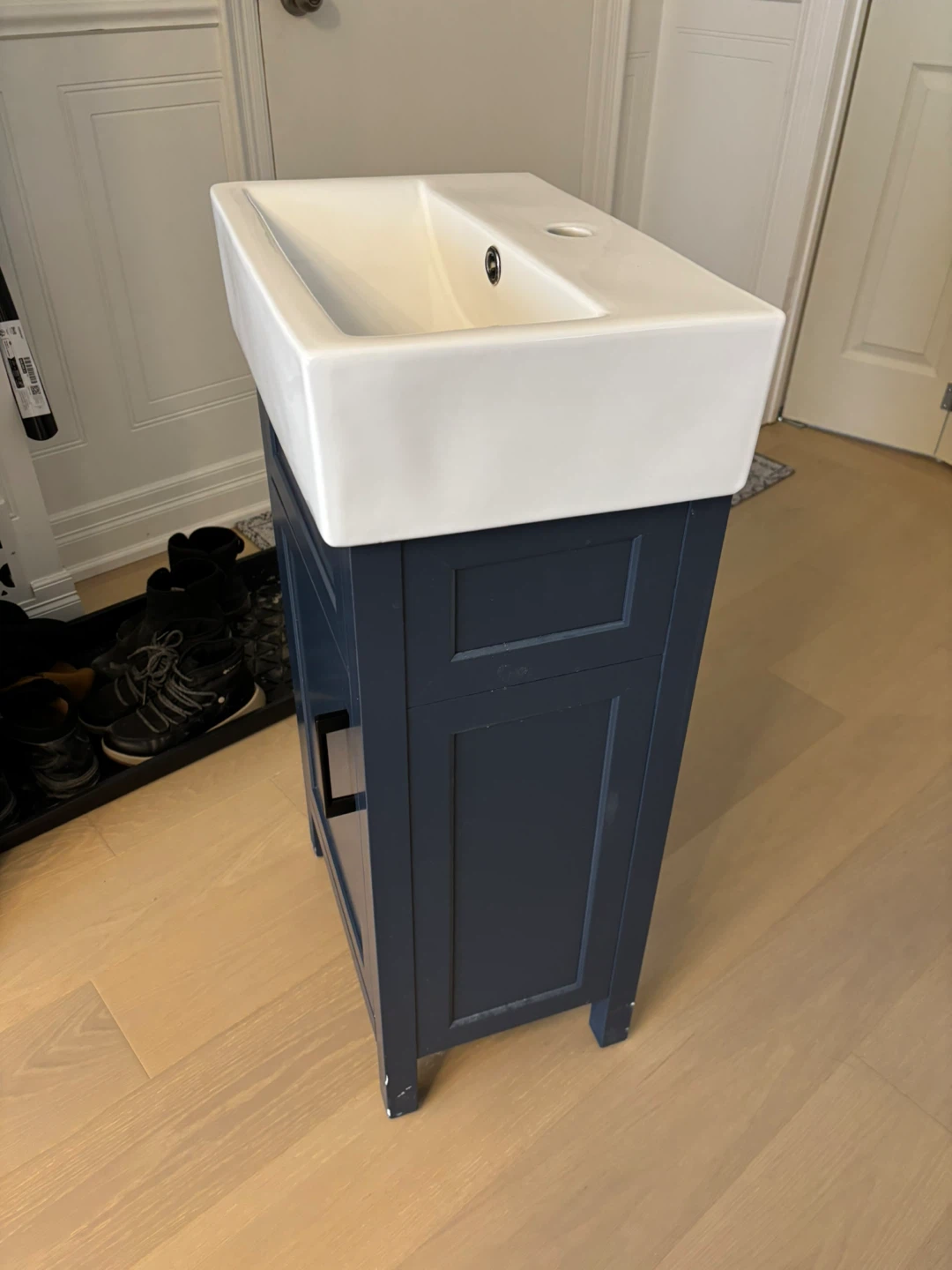 White Sink with Navy Blue Vanity Cabinet - photo 3