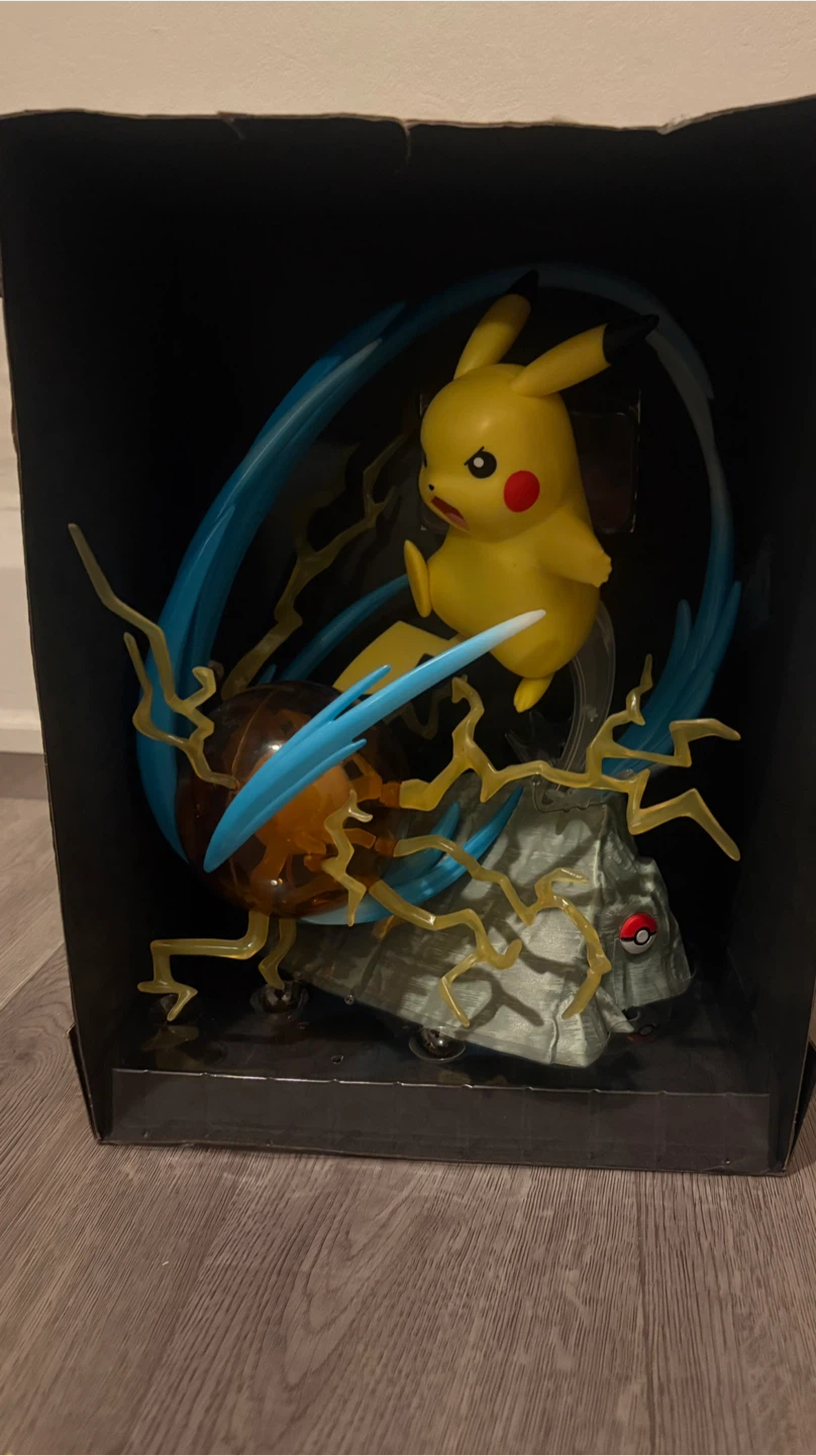 Pikachu "Thunder Shock" Figure with Light-Up Base