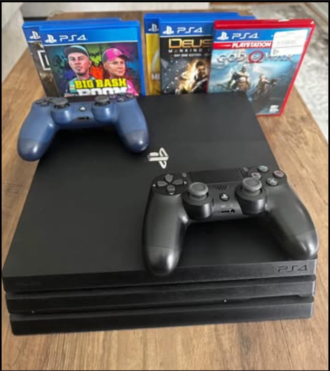 PlayStation 4 Pro Console with 3 Games and 2 Controllers