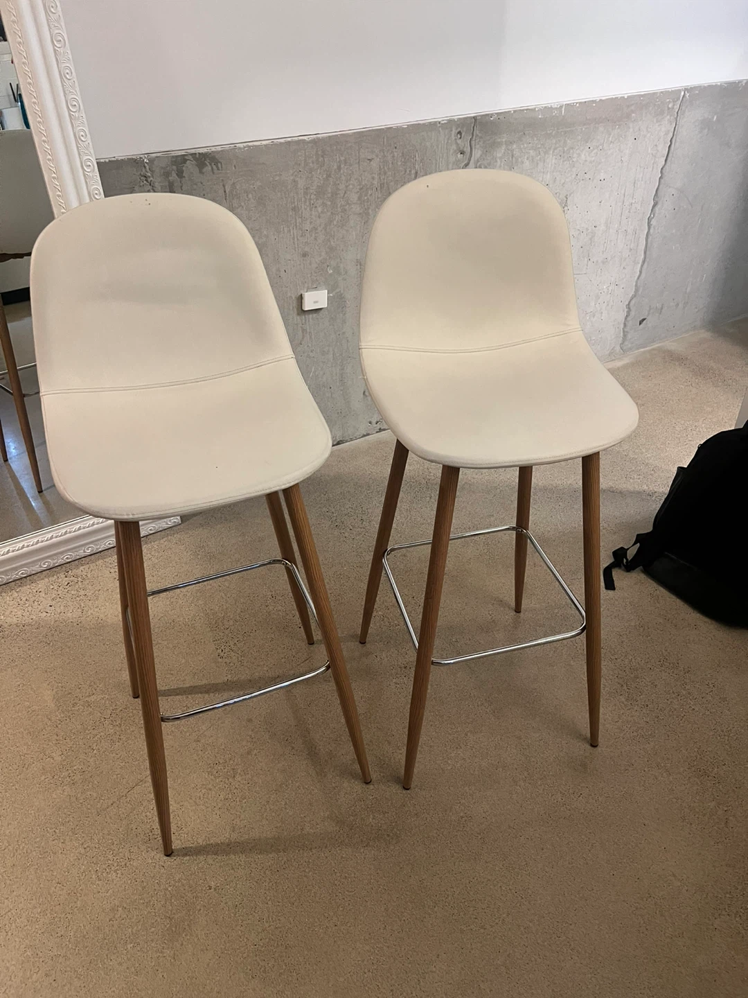 Pair of white bar stools