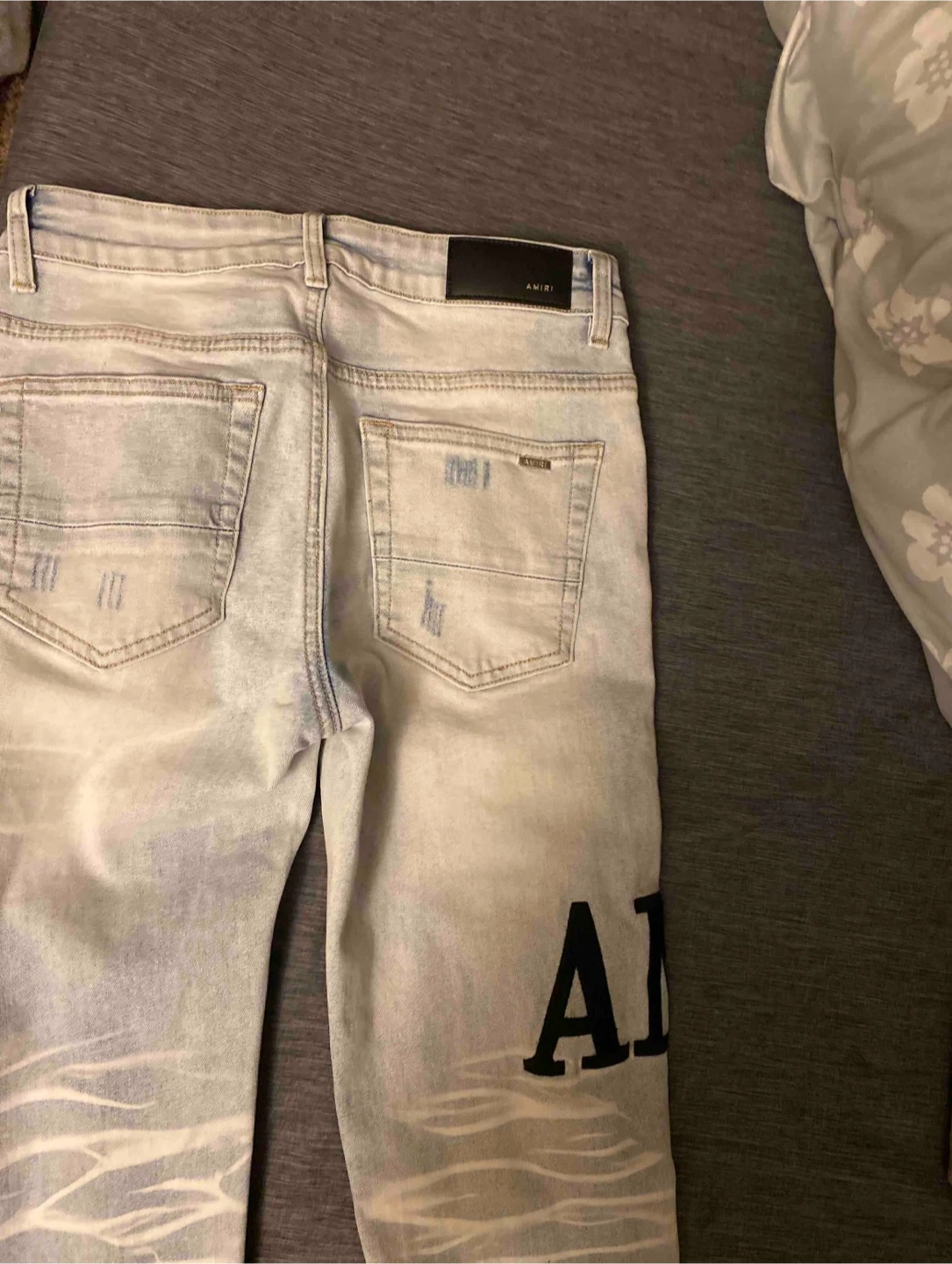 AMIRI Distressed Logo Jeans - photo 2