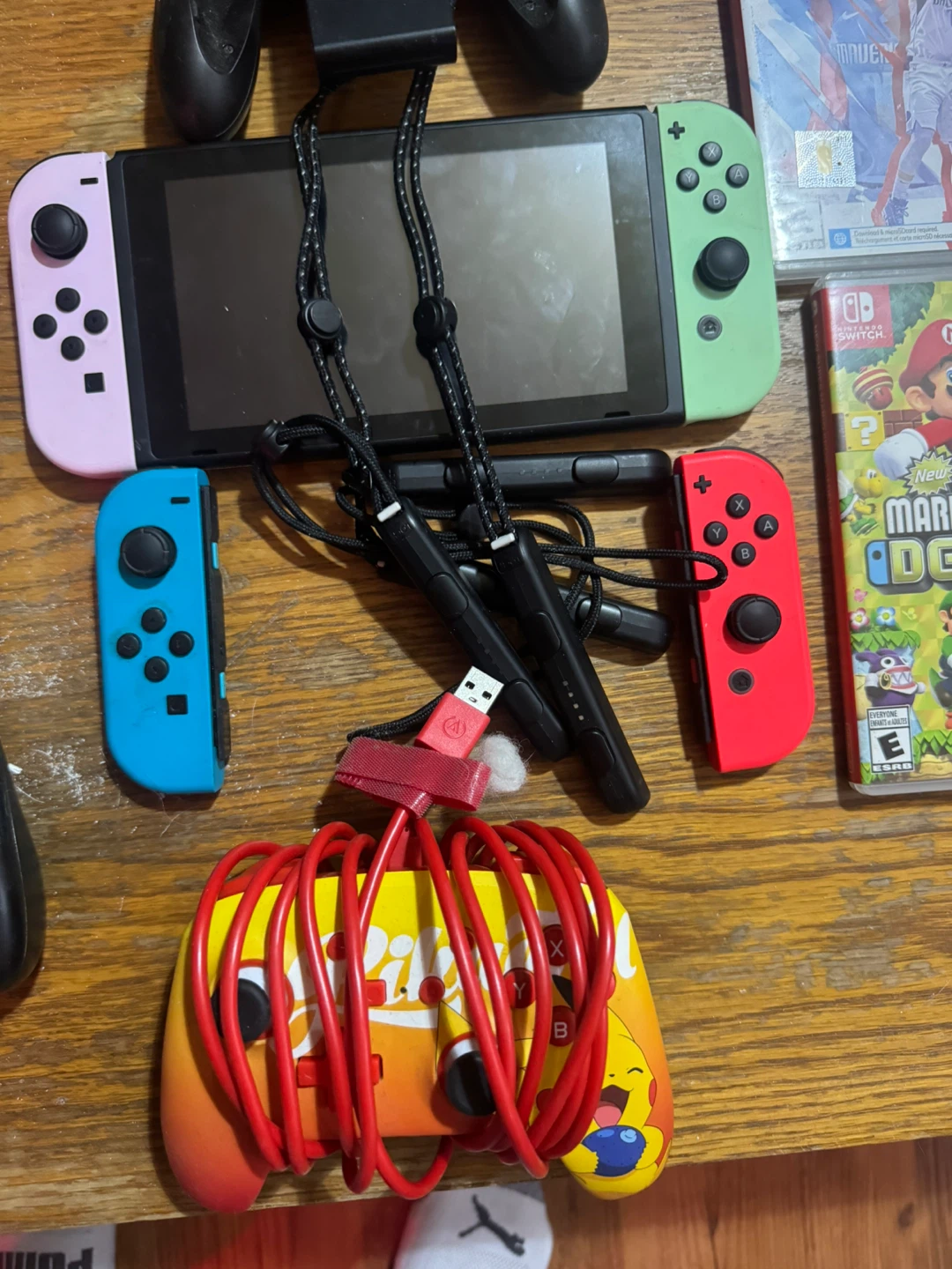 Nintendo Switch Console with Games and Accessories - photo 2