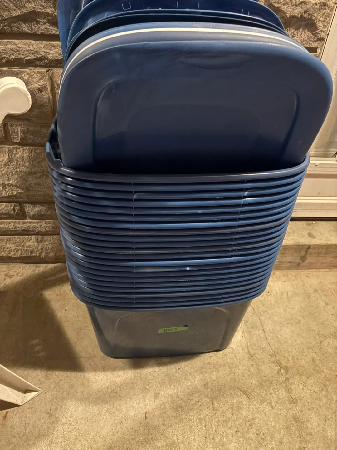 Stack of Blue Plastic Storage Bins