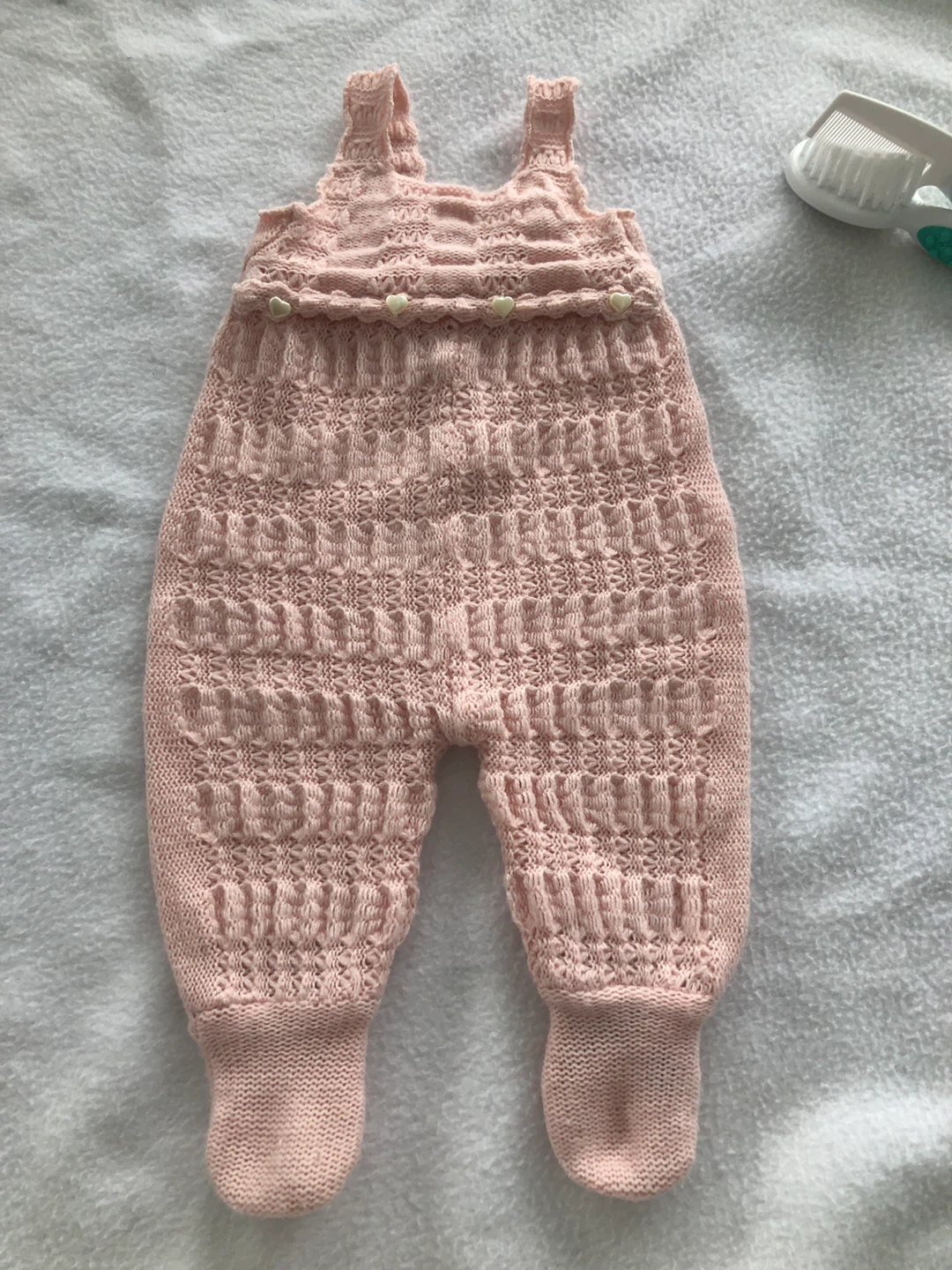 Pink knitted baby romper 0-6 months