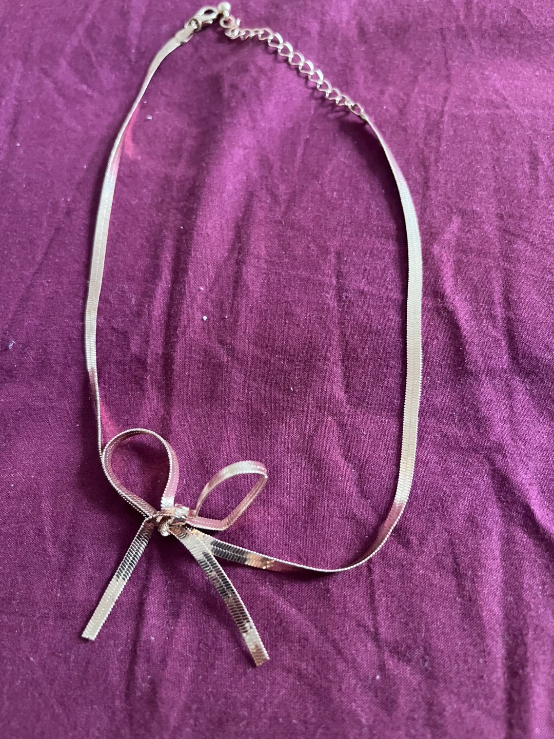 Silver Tone Chain Necklace with Bow Accent