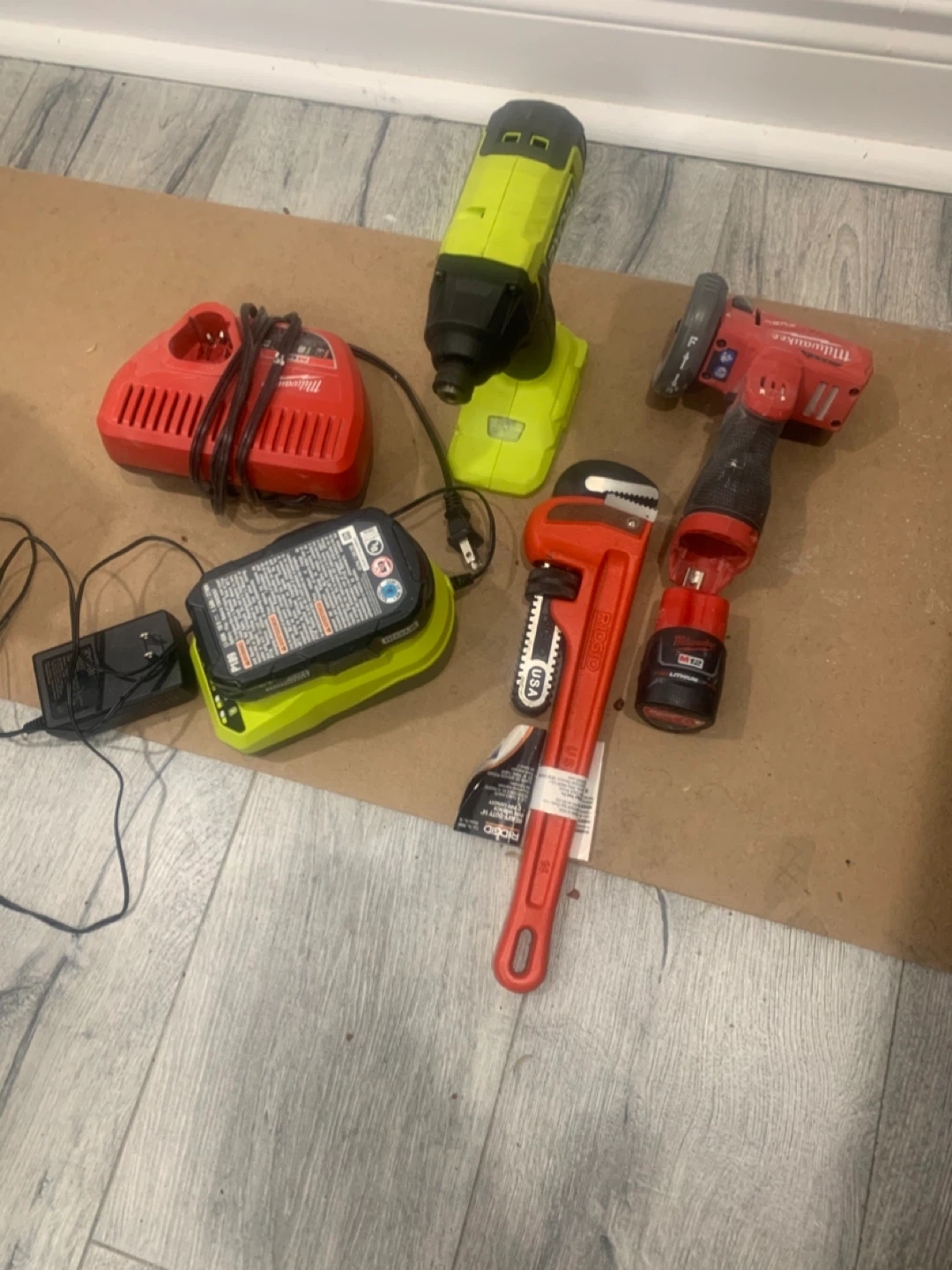 Ryobi and Milwaukee Power Tools with Ridgid Pipe Wrench