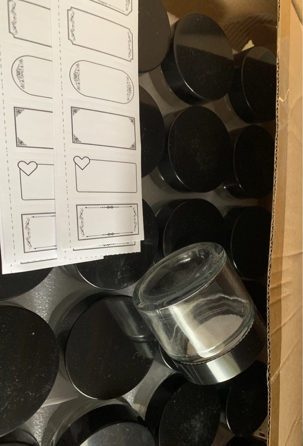 Small Glass Jars with Black Lids and Labels