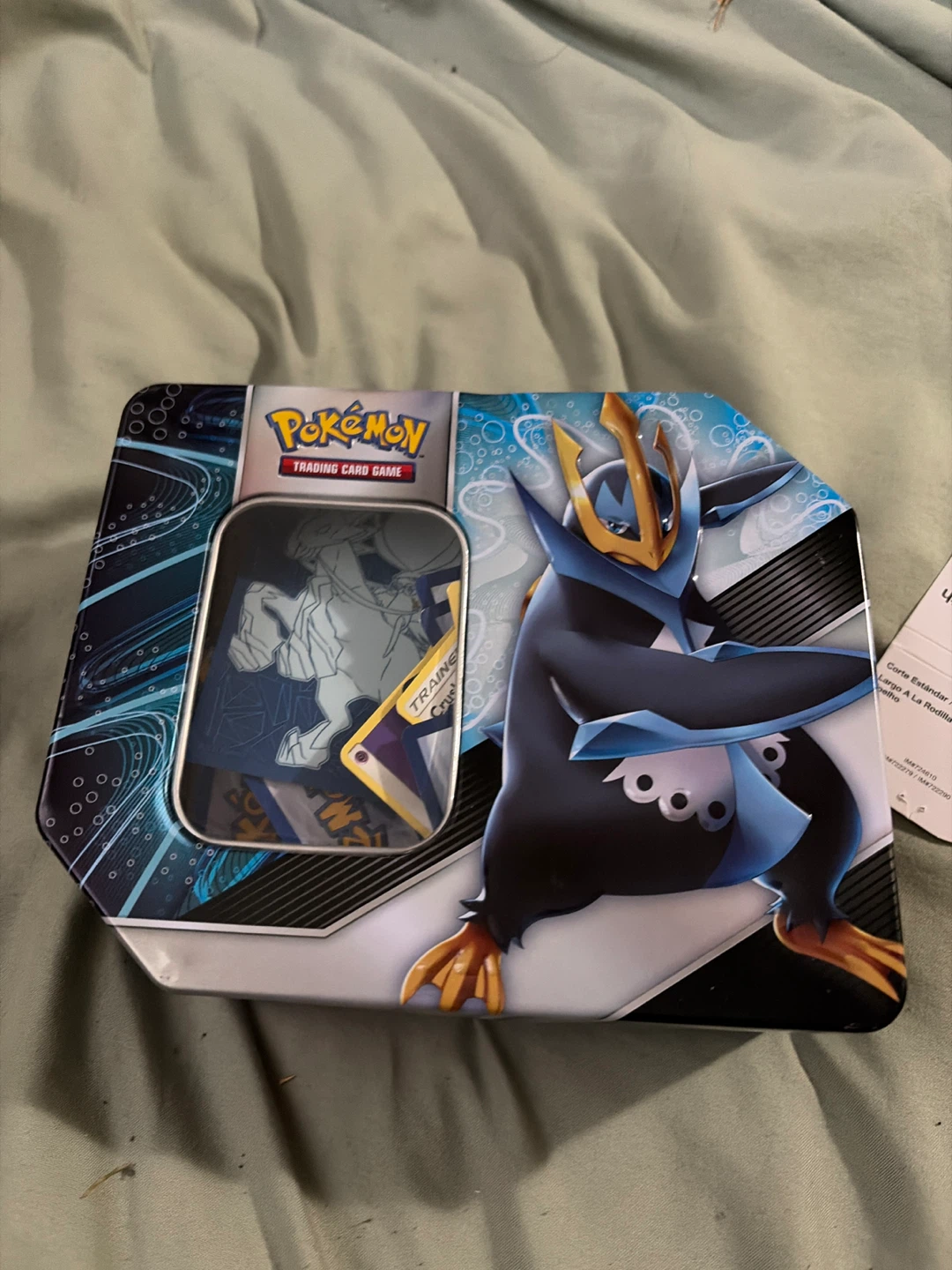 pokémon trading tin with 200+ random cards inside