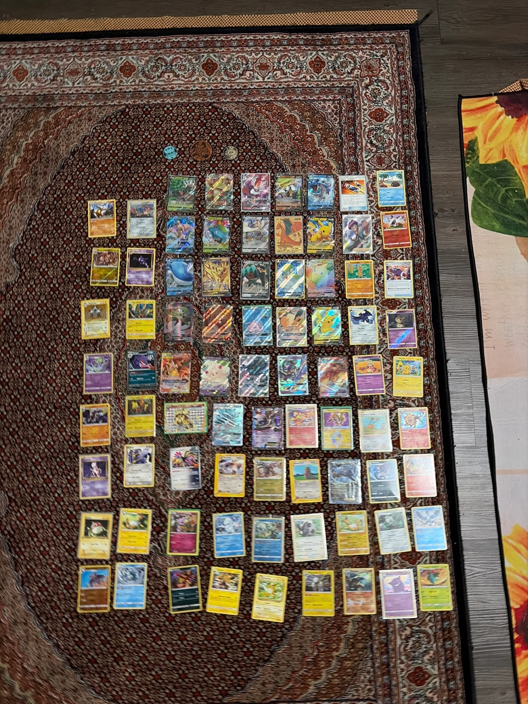 various pokémon cards and coins