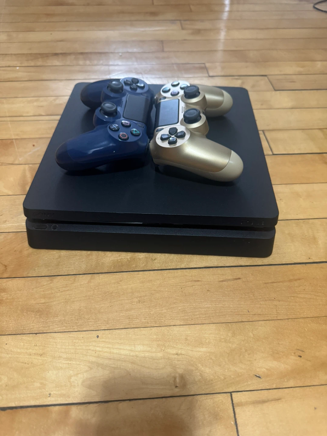 PlayStation 4 Slim Console with 2 Controllers - photo 2