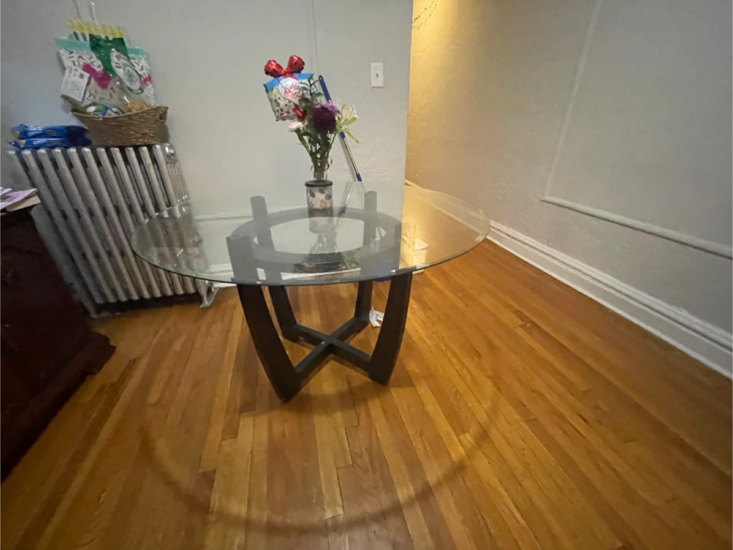 Round Glass Top Dining Table with Dark Wood Pedestal Base