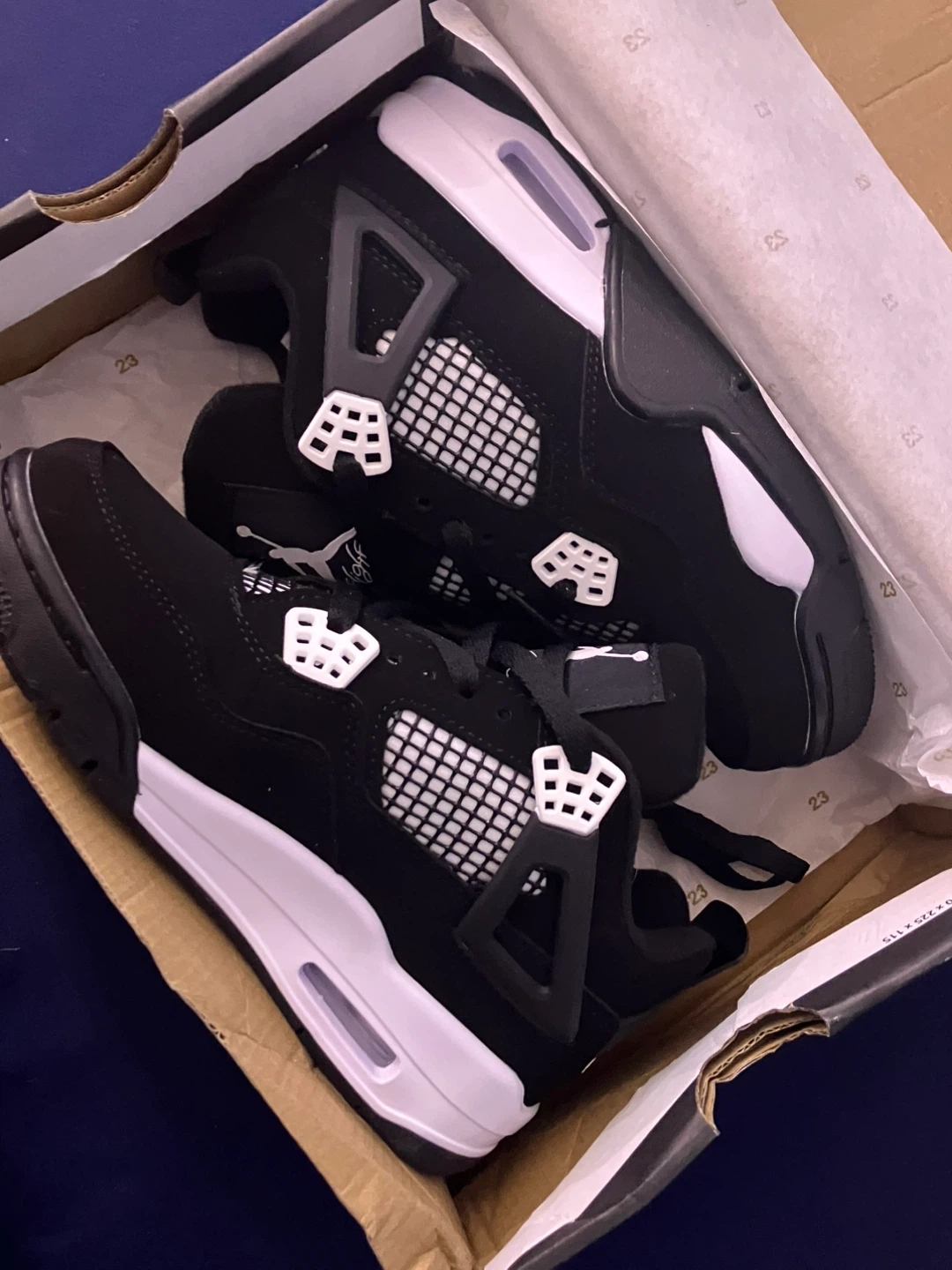 Nike Air Jordan 4 "White Thunder”