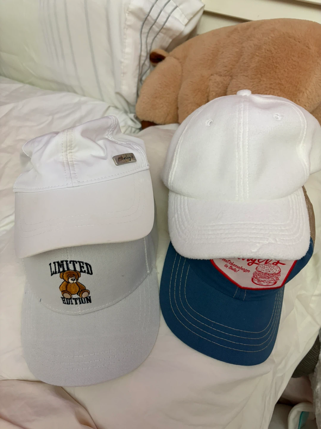 4 Pairs of hats (caps)