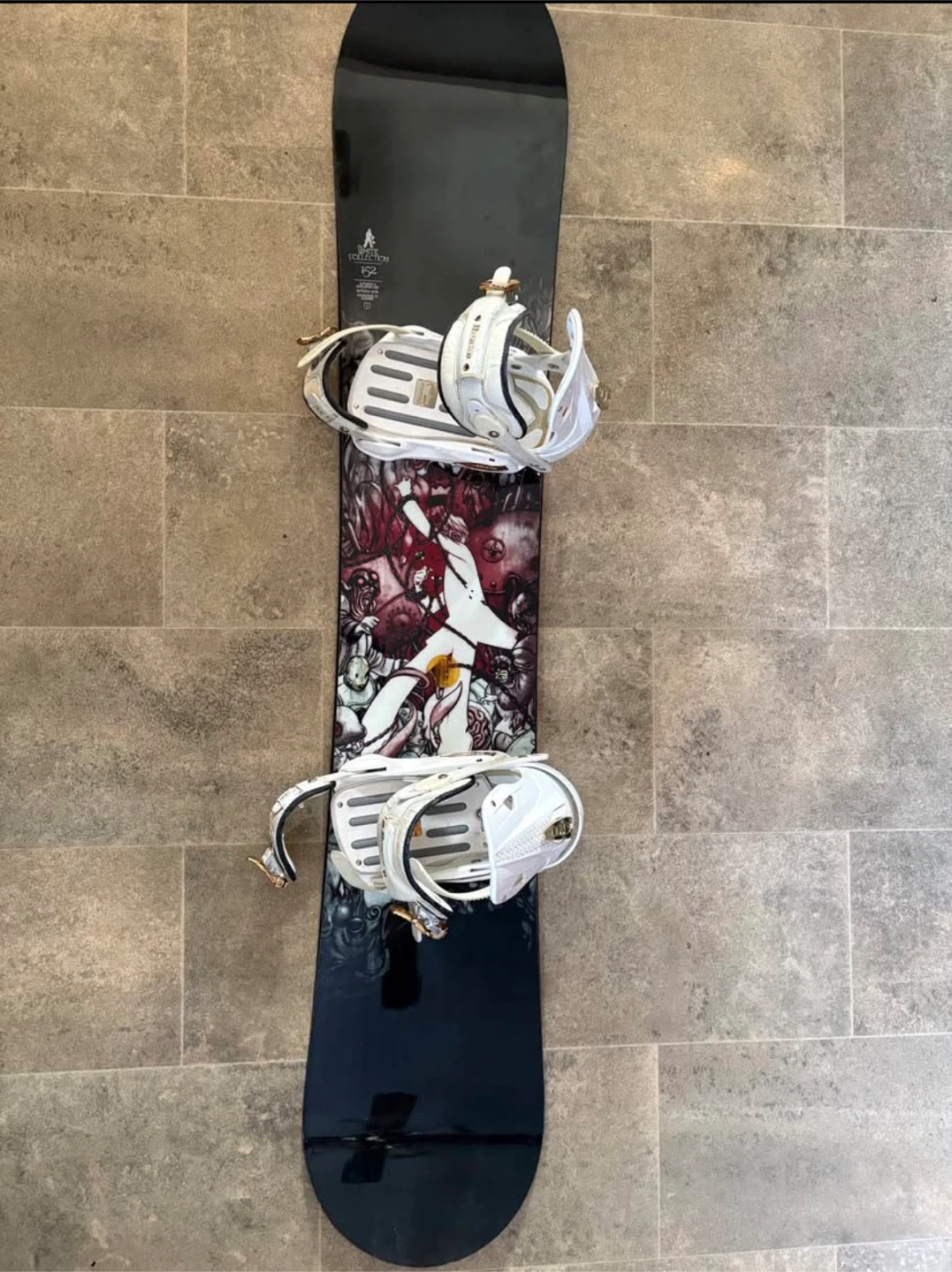 White collection Burton 152 snowboard with Drake bindings
