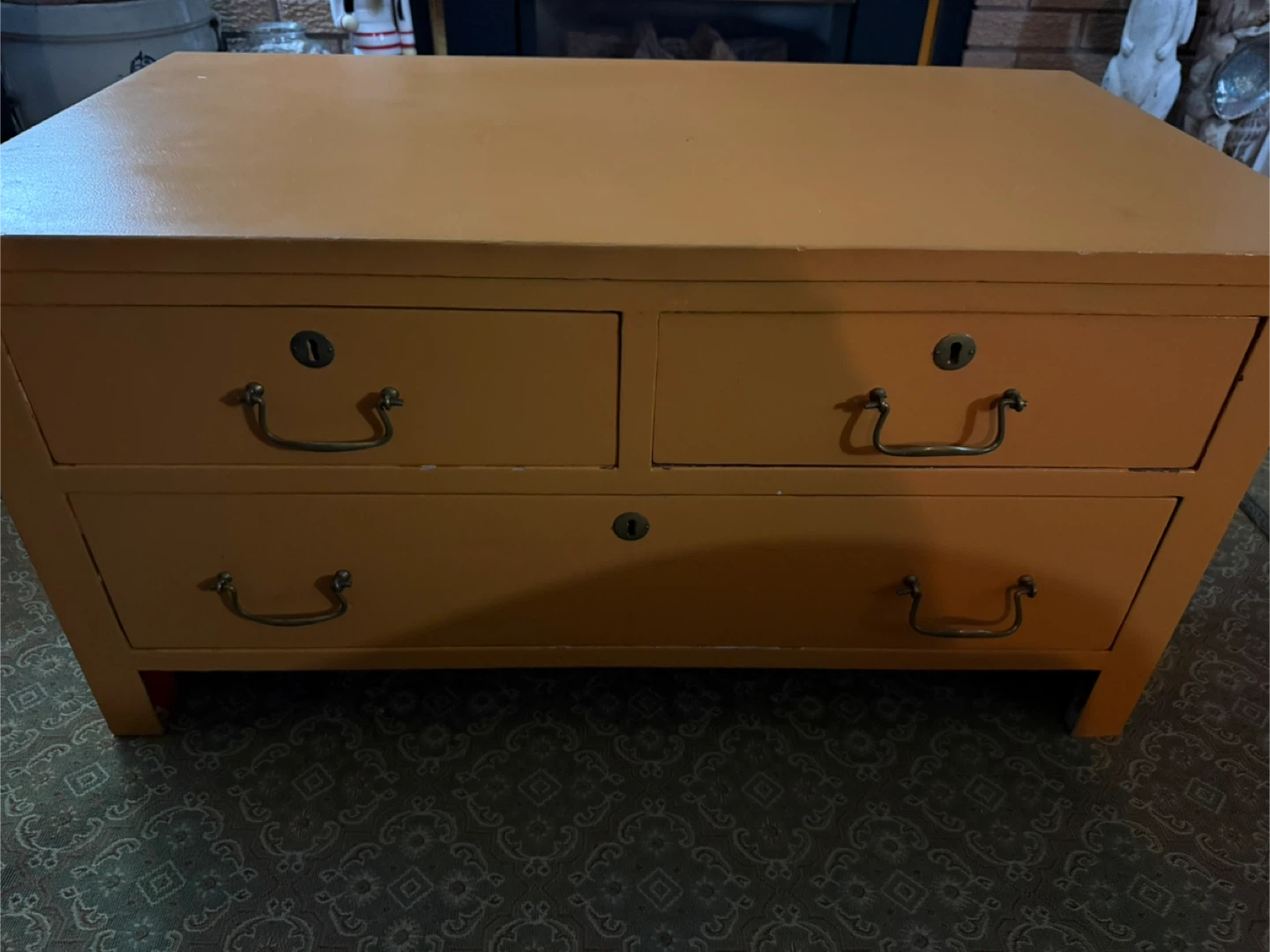 Orange 4-Drawer antique chest/coffee table