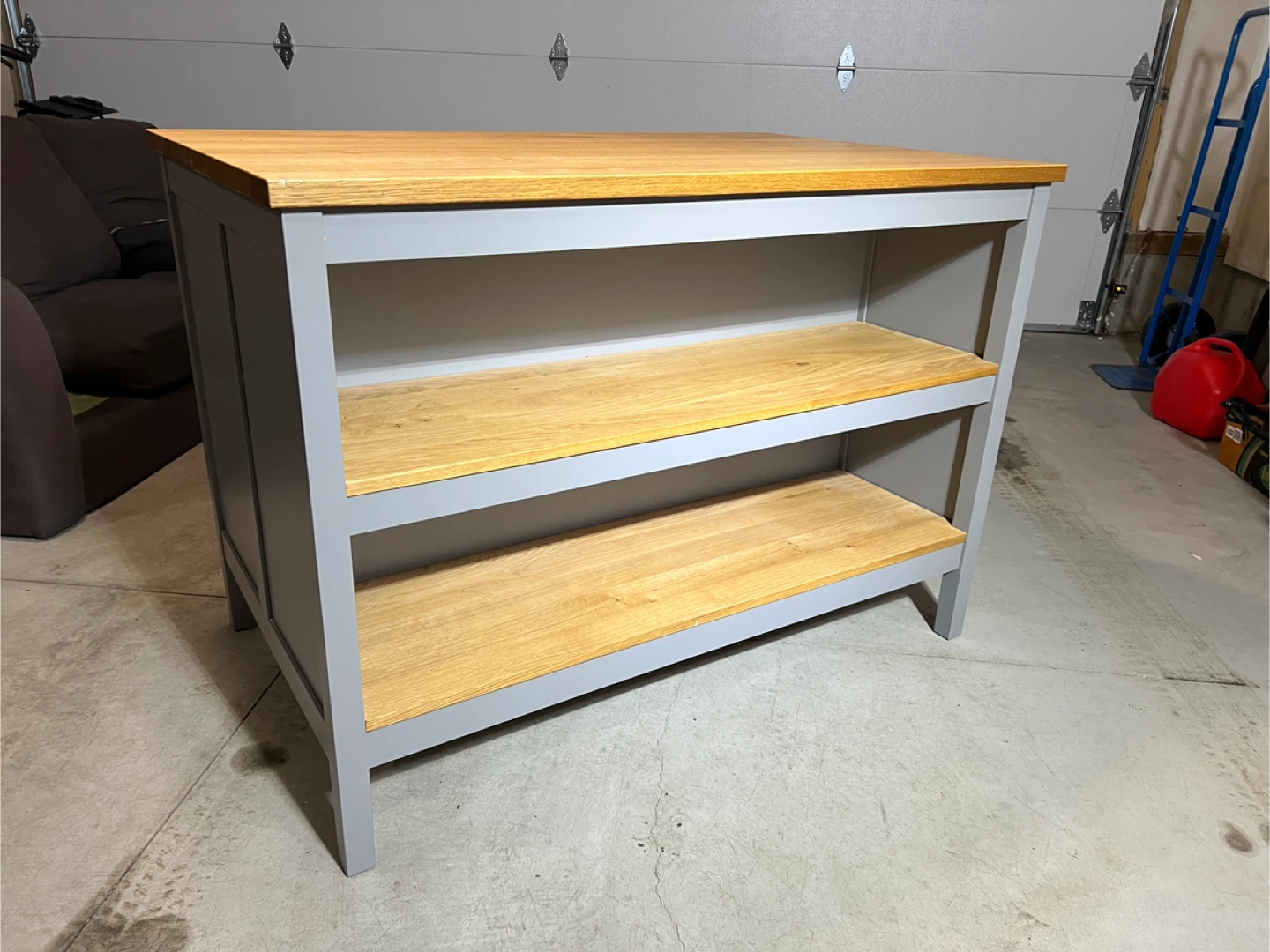Wooden top island with grey base and shelves