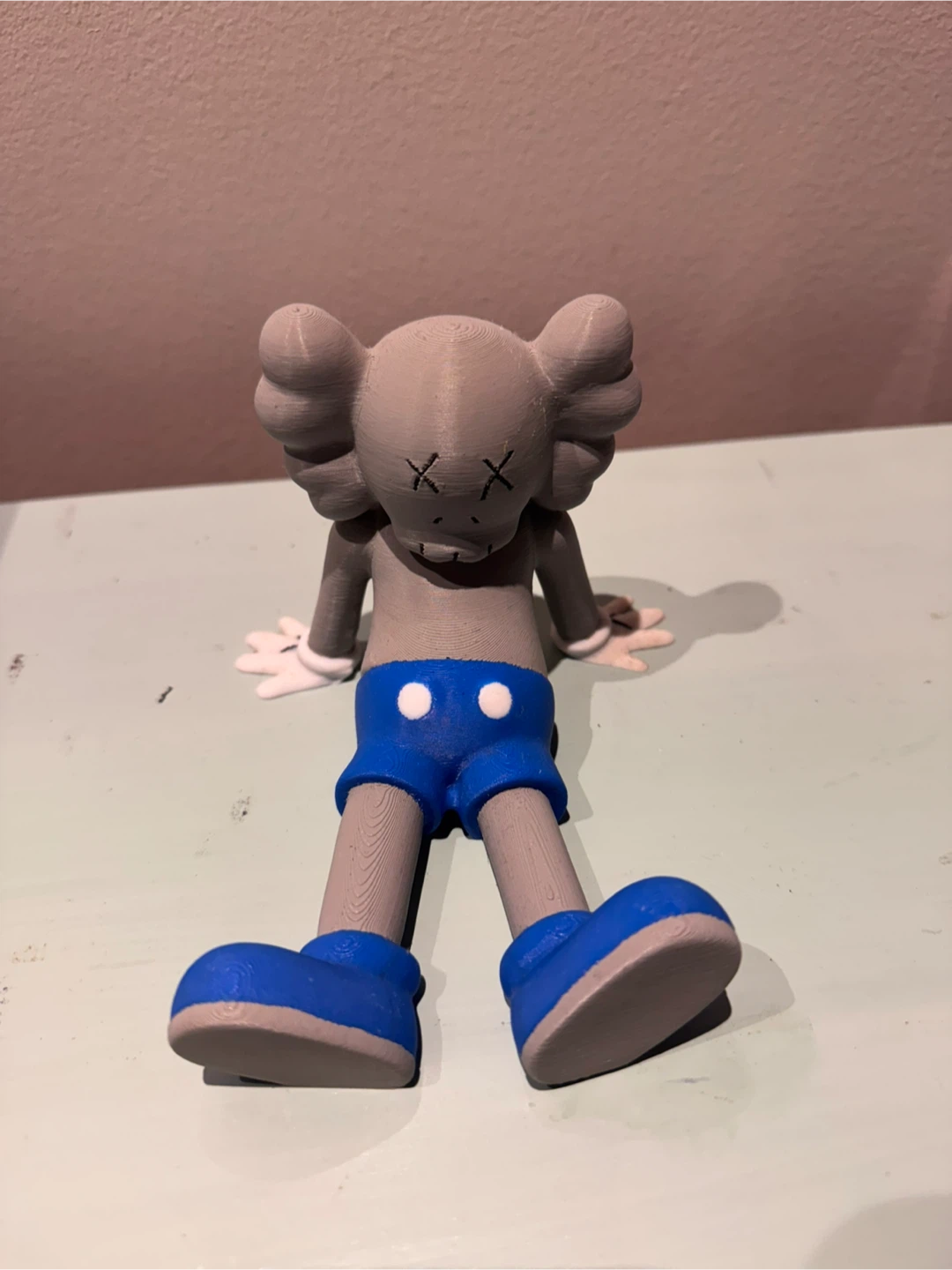 KAWS 3D printed phone and book holder - photo 2