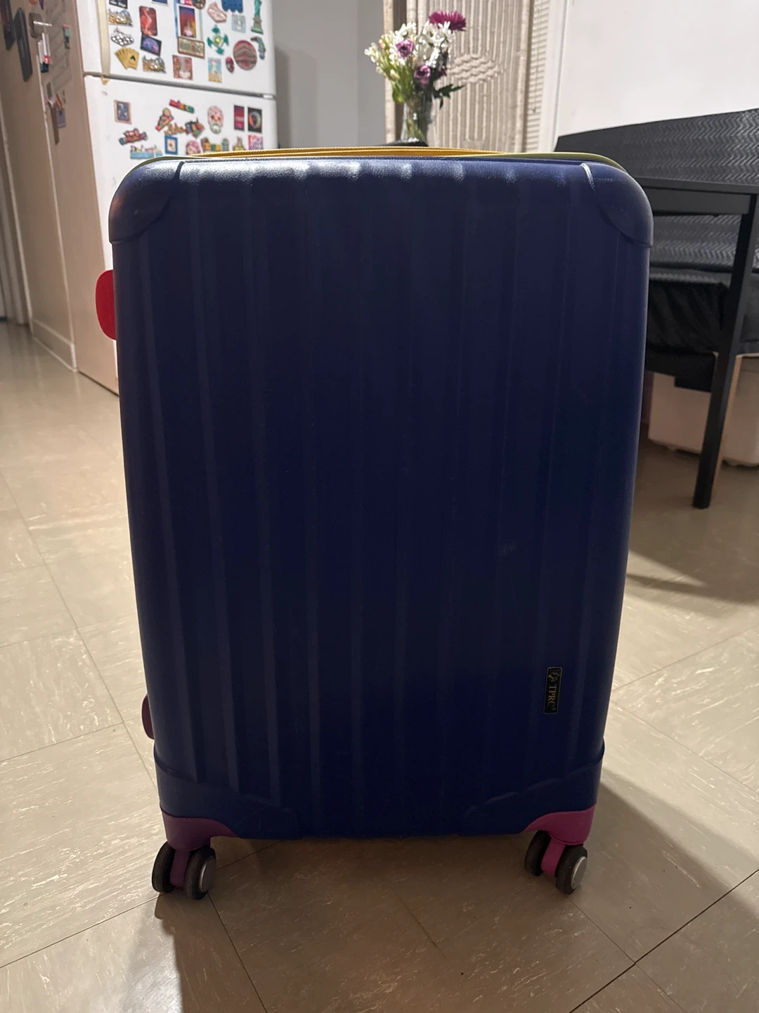 Blue medium size rolling suitcase